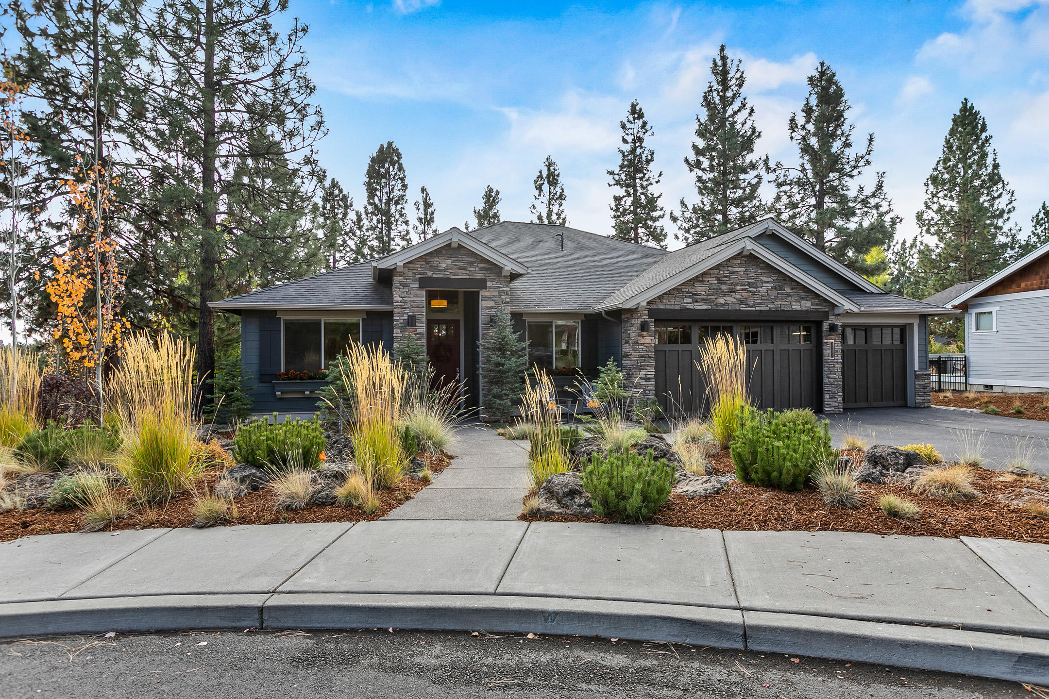 Welcome Home! Situated in the coveted Shevlin Ridge neighborhood, this perfect open floor plan by award winning local builder has room for everyone with 3 bedrooms, 3 full baths AND an office!   An entertainers delight with inviting vaulted great room plan, 2 dining spaces, and island counter that can serve up any family holiday buffet!  Step outside anytime of the year for bbqing under the covered back patio that leads to a lush green, mature landscape with separate outdoor firepit area, and calming water feature inviting you to relax and enjoy the tranquil backyard setting.  3 car garage AND 6'x14' custom built shed for ample parking and all of your storage needs for Bend recreation! Home is pre-plumbed for central vac and has ability to be wired for hot tub outside of Master Bedroom.  Approximately 3 miles to the heart of Downtown Bend, 1.5 miles to NW Crossing Shops and Restaurants, AND just about .5 mile to Shevlin Park trails/nature etc.  This is HOME!