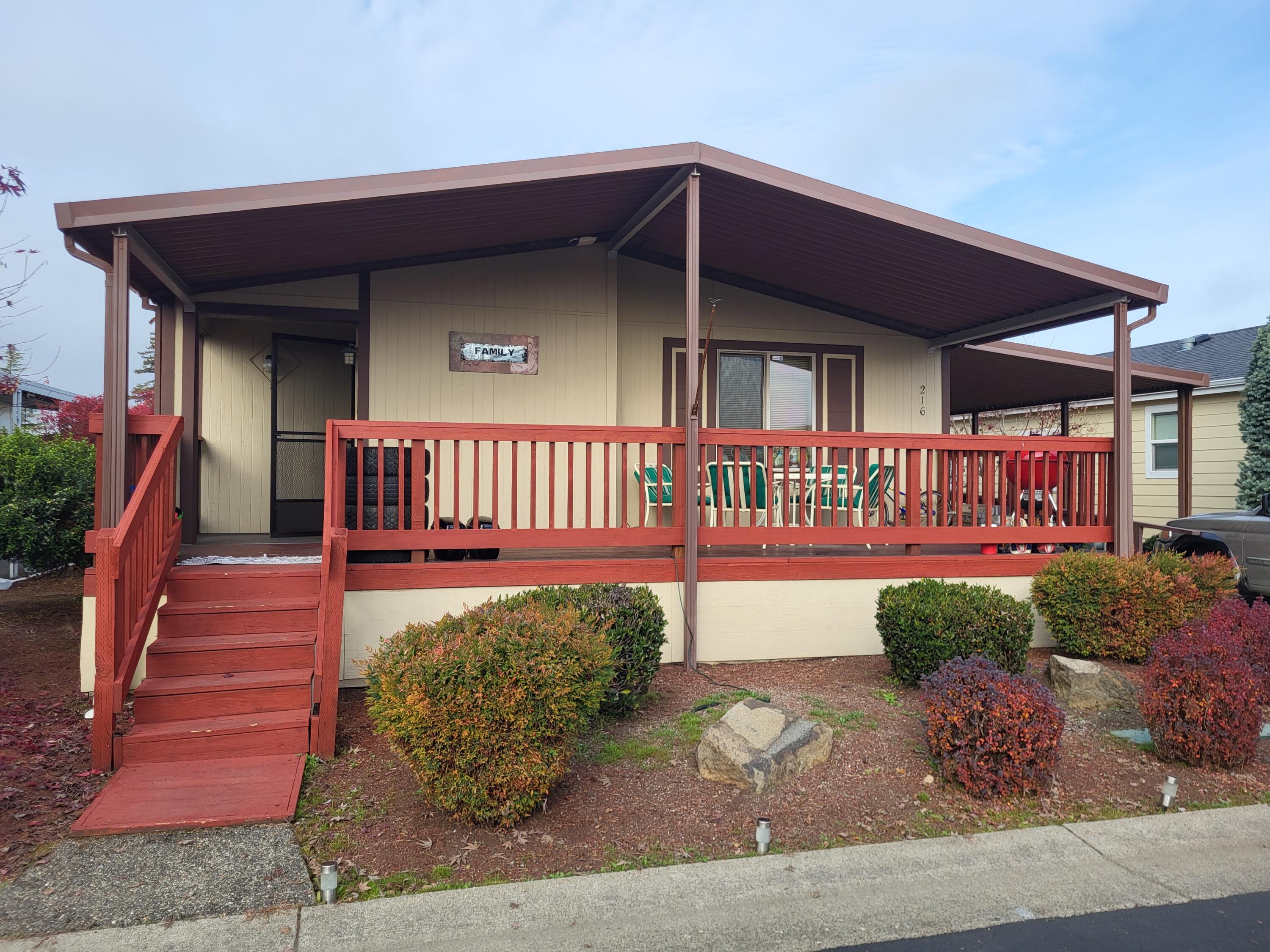 Desirable senior park consisting of newer manufactured homes located 5 minutes from in-town Grants Pass.  1986, 3bd rm, 2ba, dining rm, vaulted ceilings, attached covered carport, shed and fenced yard.  This park is very well-maintained and all homes are basically on equal par.  Westlake is a gated community.