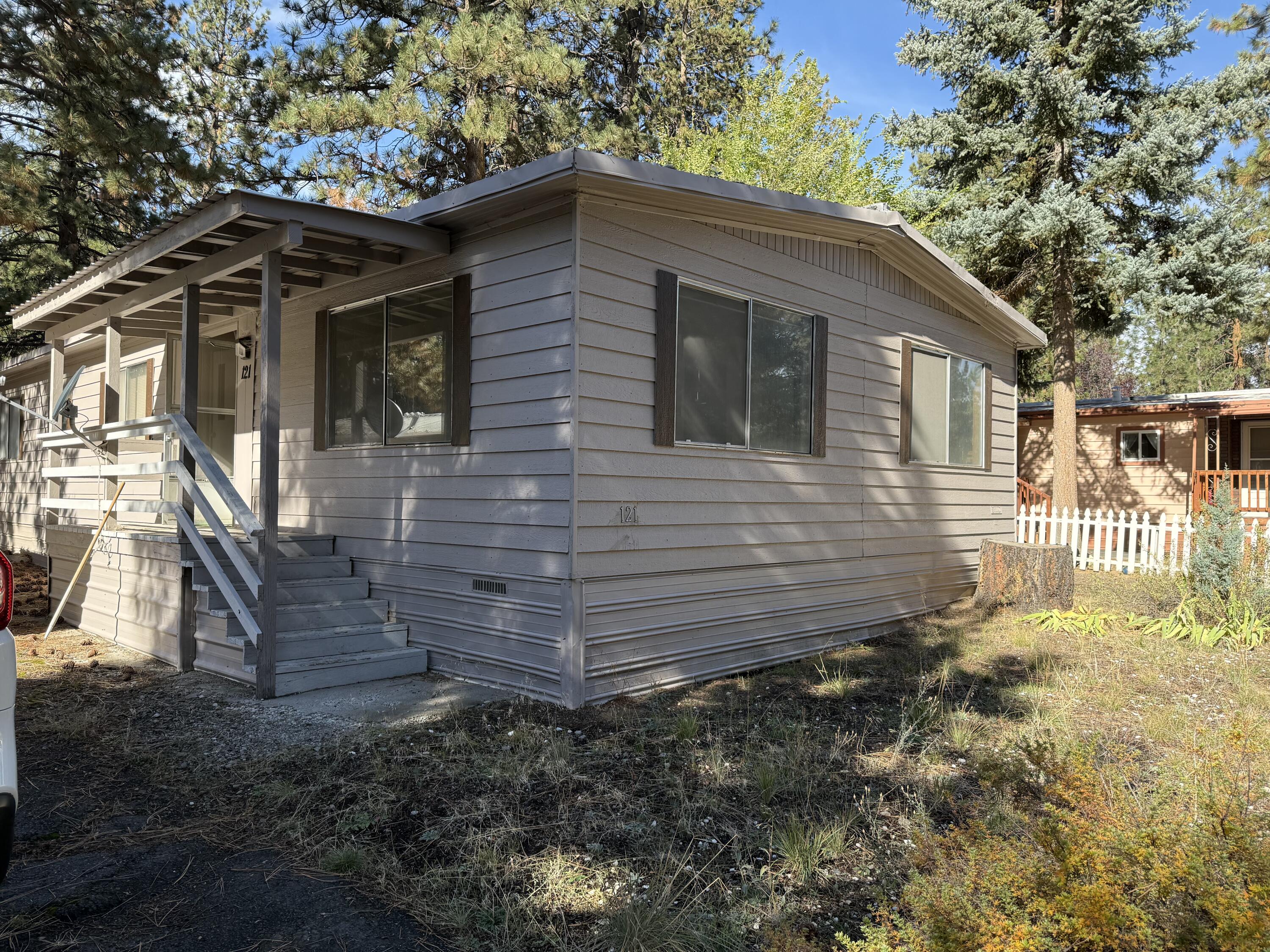 Seller is offering a $3,000 credit at closing for carpet replacement. A hidden gem ready for its glow-up! This 2 bedroom, 2 bath 1977 home offers generous living spaces, great  natural light, and a floor plan that just feels right. Move in now and reimagine it at your own pace-whether you're into modern farmhouse vibes or mid-century flair, the potential is endless. Bring your creativity and watch this one transform into something truly special.