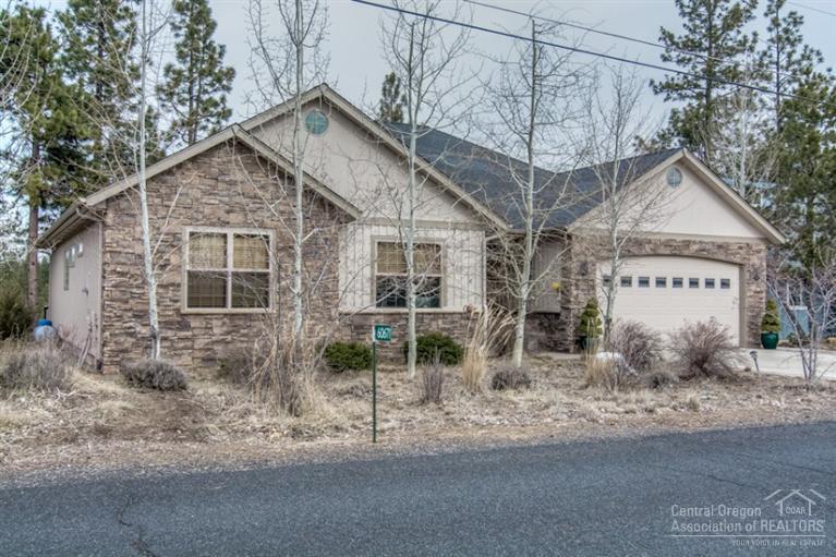 Heaven on earth in SW Bend, one-of-a-kind single family home on the Deschutes River. Gorgeous custom home w/huge great room featuring massive stone gas fireplace. 10' ceilings, 8' solid core wood doors, slab granite counters in the Chef's dream kitchen, Viking 6-bruner cooktop, built-in GE Monogram refrig. Hardwood throughout, tiled baths. See the river from master, great room & kitchen. Relax to the sound of the river at your back door. 1/2 AC. Fenced 1/4 Ac. across street, greenhouse included.