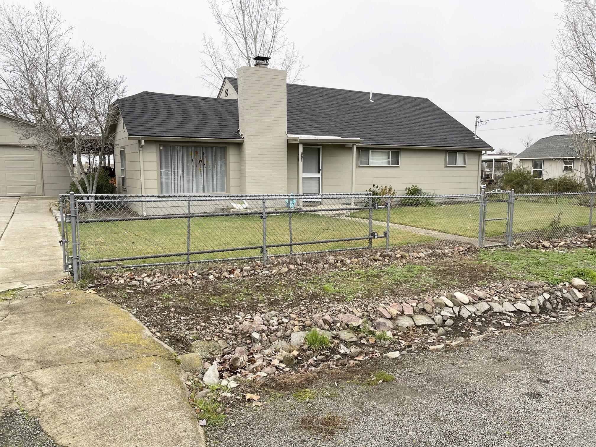 BOM - NO fault of the home. Terrific, Warm & WELL cared for, 4-bedroom, 2-bath, neat & tidy on .43 acre lot. Home will be VACANT 4-1-22.  Kitchen boasts beautiful gas range & dishwasher. Convenient location to shopping, I-5 & bus line. Newer roof. Nice 2-car garage with LARGE attached bonus room that would be terrific for a work space, shop or guest room. Backyard is large & would easily accommodate a new pool or trampoline with plenty of additional sunny yard to spare for a garden area and green house.  Zoning is MFR-20. Development & additional ADU are a possibility. Seller also has 2 adjoining properties for sale. Buyer to do due diligence on zoning & development potential. Cute house ready for new owners. Home shows very well.