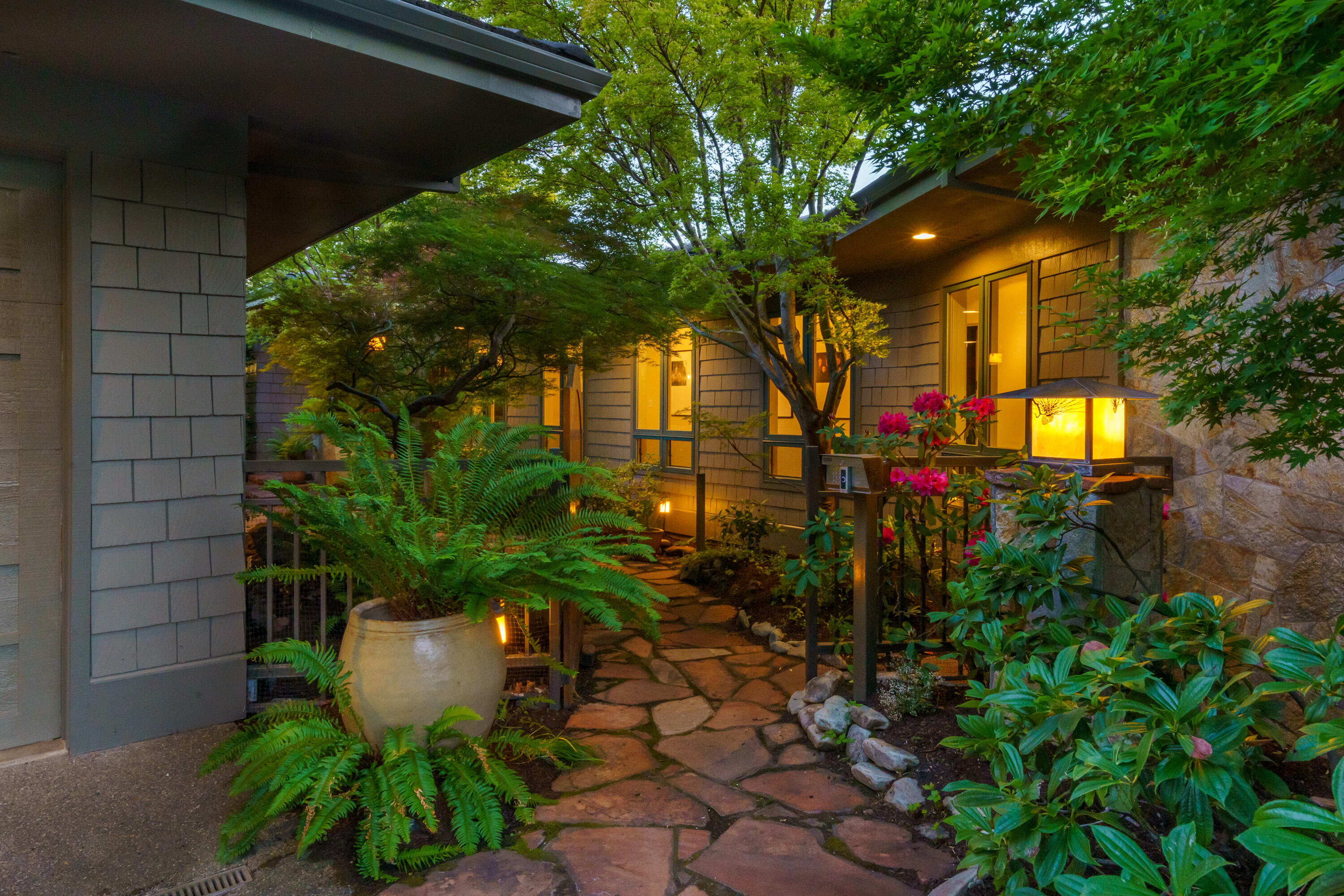 Award winning landscape design w/waterfalls, ponds & KOI fish. Tranquil setting as you enter the gated entry. Exceptional quality w/new upgrades. Expansive views of the valley, mountains & sunsets. .43  acre lot w/private mature landscaping in a highly desirable neighborhood in an area of high end homes. Perfect. Home is perfect for entertaining w/all high end amenities. Lg windows to tak in the views. Main level master suite. 4 bdrm, 3.5 baths + office/library. Gorgeous lg kitchen w/breakfast rm, lg formal dining rm w/ fireplace. Open floorplan. Amazing backyard w/in ground pool, hot tub w/ Arbor, landscaping lighting. Separate rm off garage w/ hobby room. Tons of storage + 870 SQ  FT of basement area. Perfect home & property.