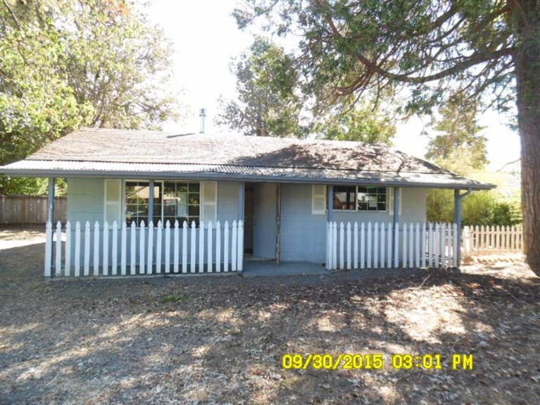 Real close to downtown and the river. County has it as a one bedroom, but could be a two bedroom! Property needs paint and flooring re-done and the yard brought back. Would make a nice rental or weekend rental as it is close in to the river and downtown. Take a quick look as it will not last long. Sold As Is Cash.
