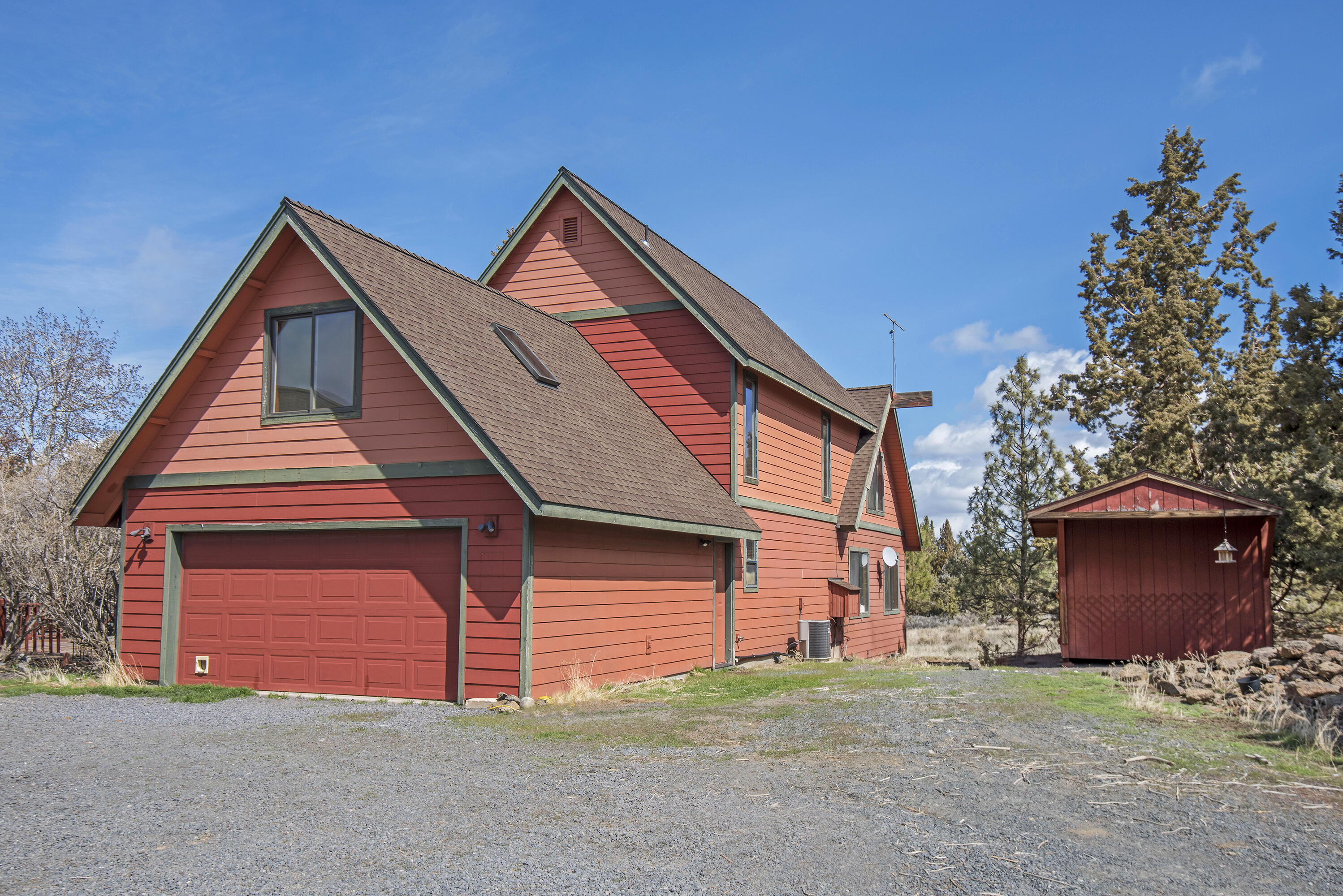 A diamond in the rough, wonderful location east of Bend. Lots of usable space, vaulted ceilings, wood accents and many buildings. Carpet and flooring have been removed so the new owner can do their own. All this plus pasture, great metal barn and huge metal shop. There is a garden potting shed, additional shed, and a newer not attached studio that was built approximately four years ago. Cascade Mountain views are visible from the primary suite. The location says it all, beautiful sunsets and sunrises on a dead end street.
