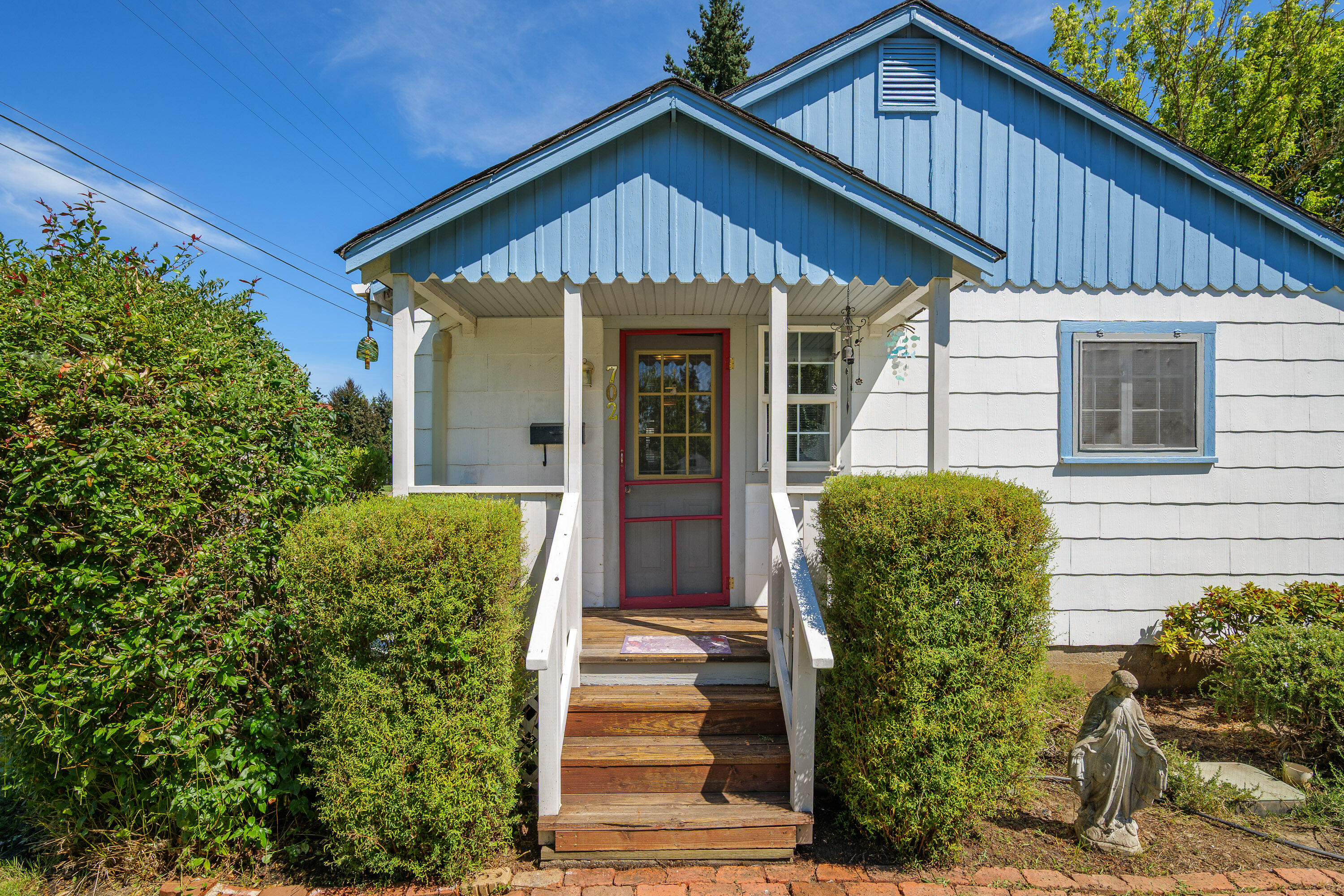This adorable 2-bedroom, 1-bath home is brimming with character and possibility! Step inside to original hardwood floors that add warmth and charm. Enjoy your morning coffee on the sweet front porch and/or relax in your private back courtyard.
A detached garage offers a workshop area plus a loft for extra storage, and the property also includes RV parking for all your toys!  Recent upgrades like a brand-new HVAC system mean comfort and peace of mind year-round.
Centrally located close to shopping, schools, and parks, this cottage is ideal for first-time buyers or as a smart investment property. Affordable, cozy, and move-in ready—this one is a must-see.