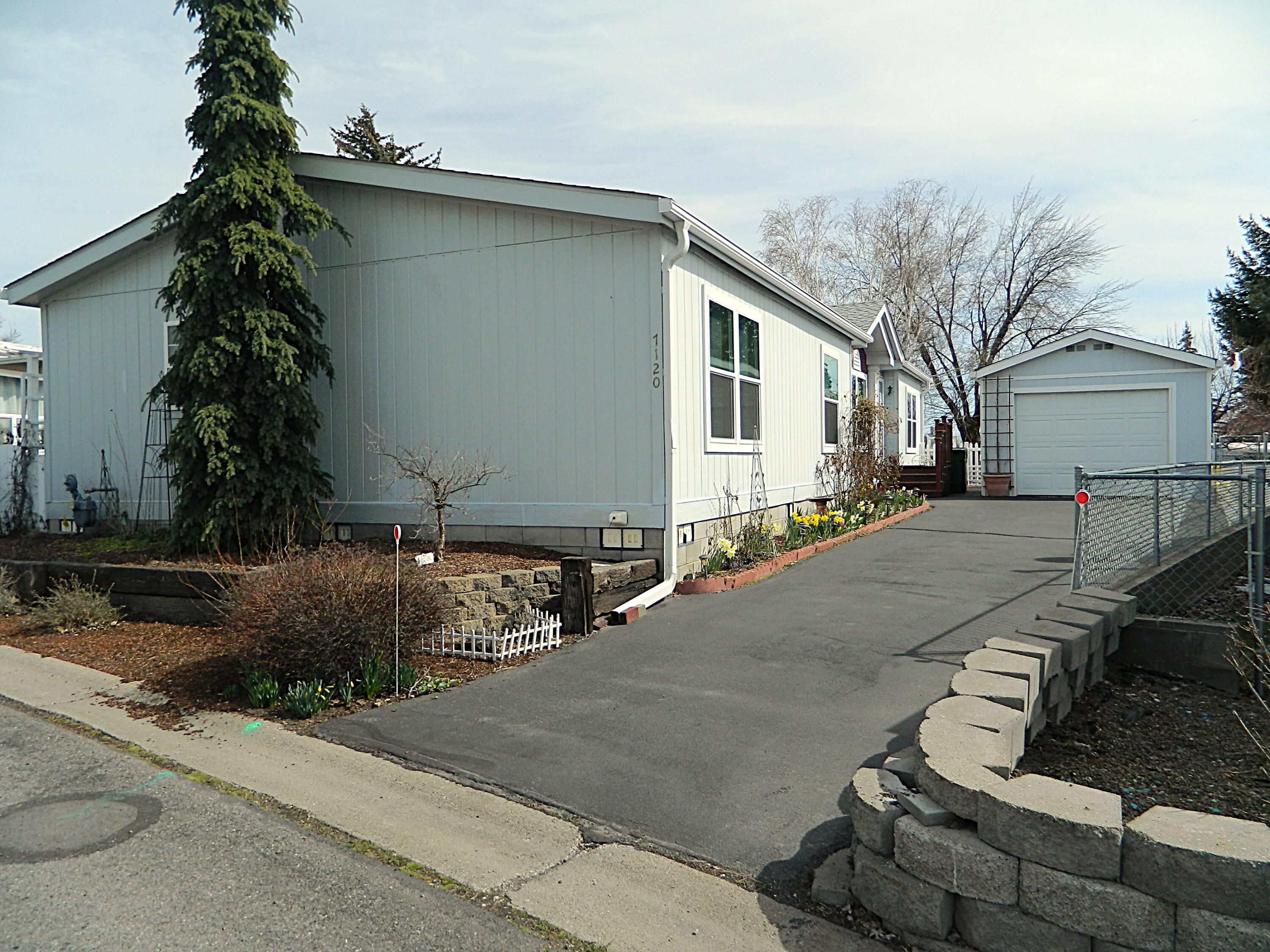 Don't miss out on this beautifully maintained home in the Country Green Estates. This 3 bedroom 2 bath home with 1782 sq ft and a 1 car detached garage sits on a cul-de-sac. It has a really nice open floor plan with only a large kitchen island separating the kitchen and living/dining area. The island includes a sitting area and the kitchen has plenty of counter space and a pantry. The primary bed has a walk-in closet and large bath with a garden tub, separate shower and a split double vanity. The remaining 2 bedrooms are good sized, one with a walk-in closet. The detached garage has 220 wiring added. The yard is tastefully landscaped and easy to maintain. This home is in the Ferguson and Henley school district. There is a storage shed with added shelves for extra storage. The seller has purchased a home warranty that is transferable