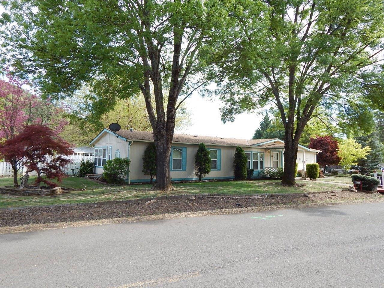 Highly desired ''Better Homes and Garden'' home in Sunburst Acres. 1993-Home on .39-acre with gorgeous yard and detached oversized 2-car garage has just about everything a person needs. This is on a community water system and city sewer. New roof and new heat pump in 2017. Inside the home you will find a large bright kitchen with solid oak cabinets, kitchen sink takes in the view of the beautiful backyard from the oversized window. There is storage galore throughout the home. This home provides you with a great room that has a built-in hutch and ceiling fan, tons of windows, off the kitchen as well as a formal living room. Split floor plan, all rooms of great proportion, master with 2-sinks, soaker tub and single shower. Throughout the home you will find dual pane windows. The yard is where the Better Homes and Garden come to play. Backyard is full of spring bulbs, beautiful perennial bushes, mature trees, garden area and more! RV parking alongside garage.