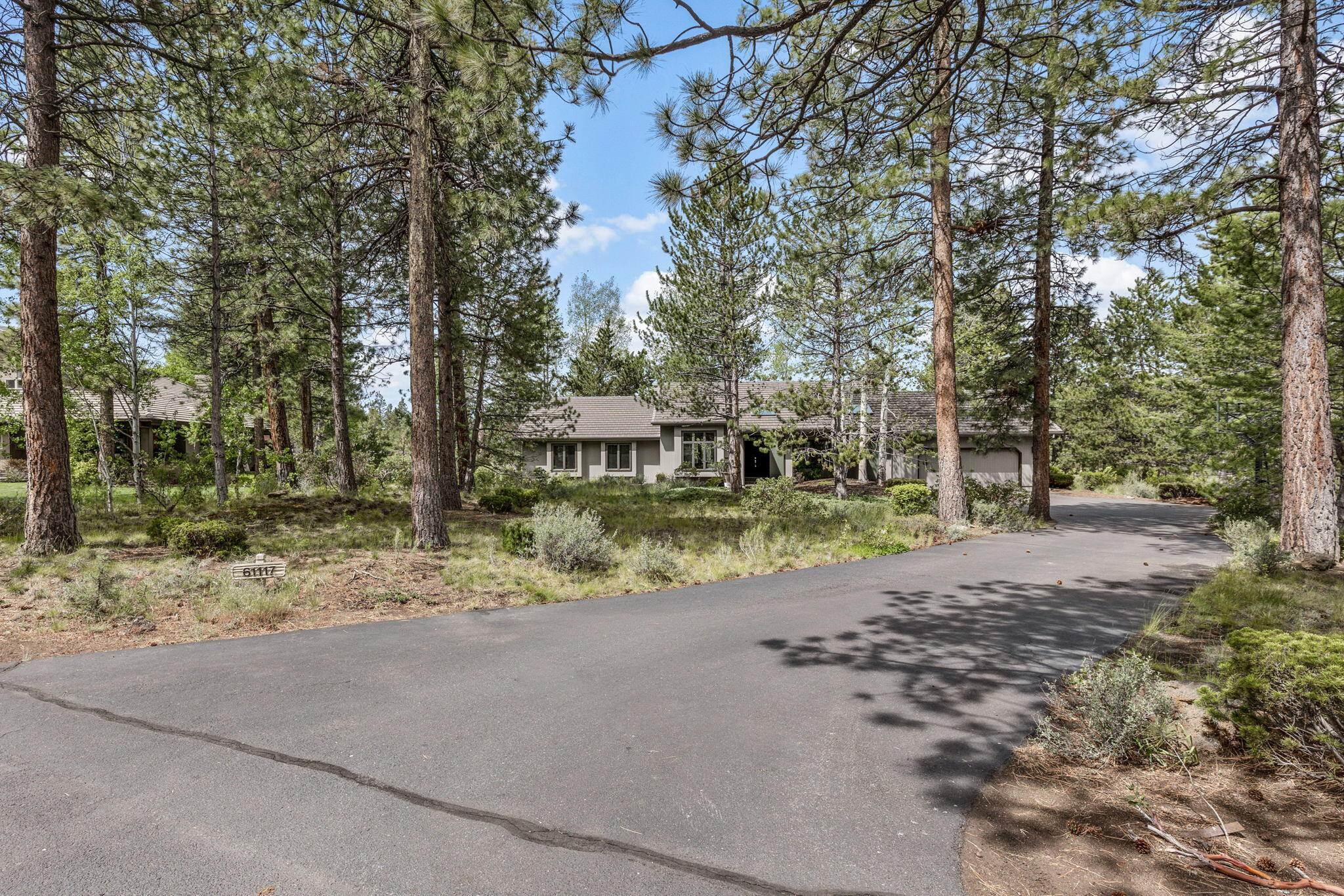 Fantastic floor plan on a generous lot in a gem of a neighborhood, Sunrise Village! Open floor plan with kitchen, dining and living room all open to a beautiful backyard. Well-appointed kitchen and gorgeous built-ins in the dining room with wood-burning fireplace in the living room to keep things cozy. Primary suite on the main accommodates a king size bed with dual walk-in closets, large bathroom with soaking tub and two vanities. Two more bedrooms and a bathroom on the main with an official office/bonus room perfect for work at home or play zone. Upstairs offers another bed/bonus room with its own bathroom. This Well-maintained home has easy access to the Deschutes trail, this is an outdoor paradise! HOA amenities include pool, hot tub, clubhouse, great for entertaining large crowds. 25 minutes from Bachelor and the lakes or ride your cruiser into town all while enjoying a quiet, secluded neighborhood.