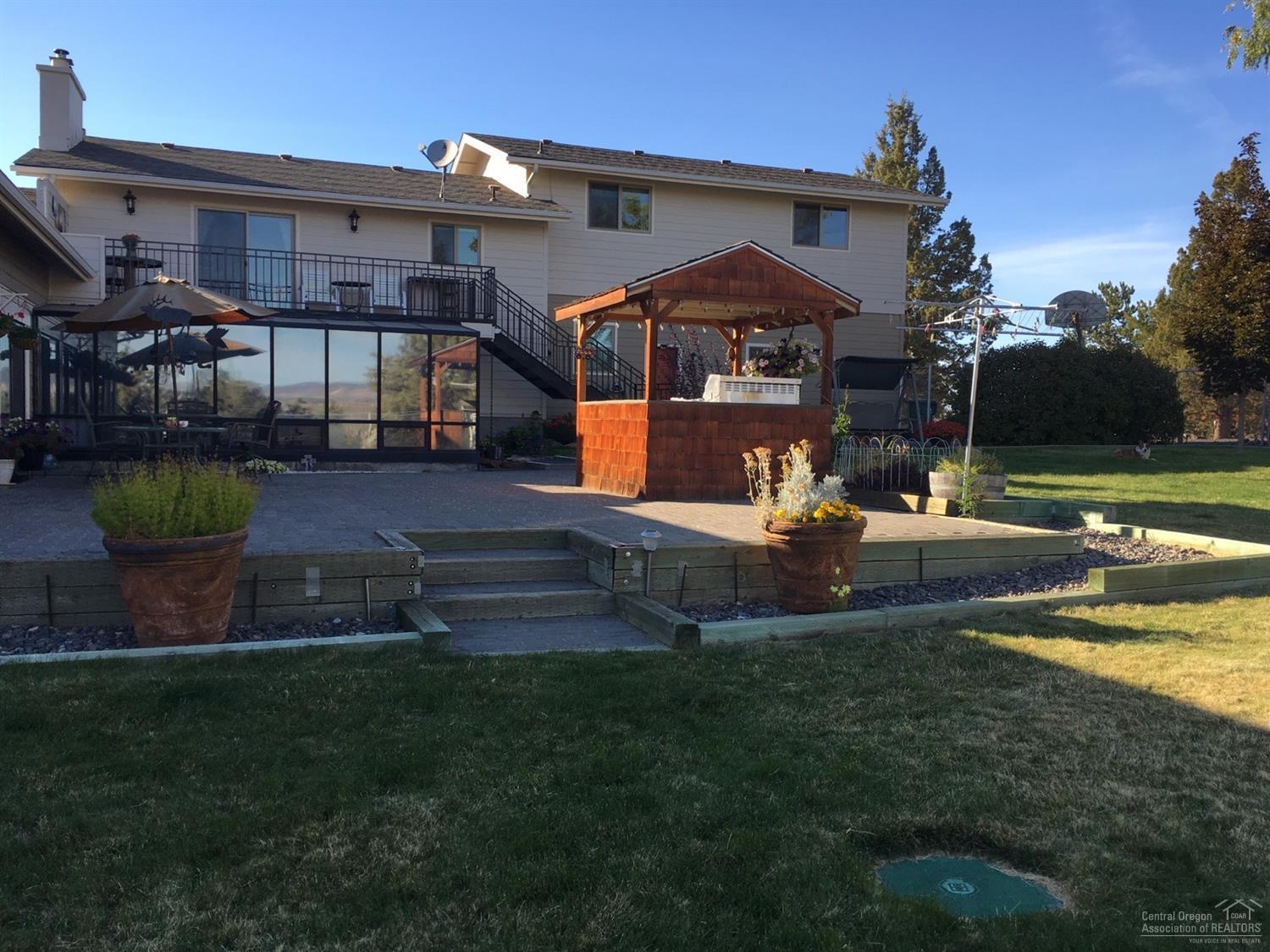 Solar heated salt indoor pool with hot tub and sauna in resort room. Kitchen & bedroom included in the swimming area. Over 1 acre fenced for animals, 4-H set up with large 24 x 32 shed. 4 Bedroom 4 bath 2424 sq ft split level home on 3.26 acres.