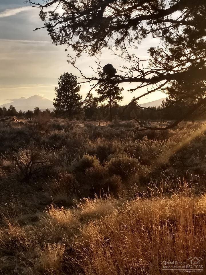 Great 2.5 acre parcel just 6 miles outside of Sisters off a quiet paved road. Property backs to an open field with wonderful Black Butte and Cascade Mountain Views. Nice neighborhood with reasonable protective CC&R's. Build your dream home here! Utilities at street.
