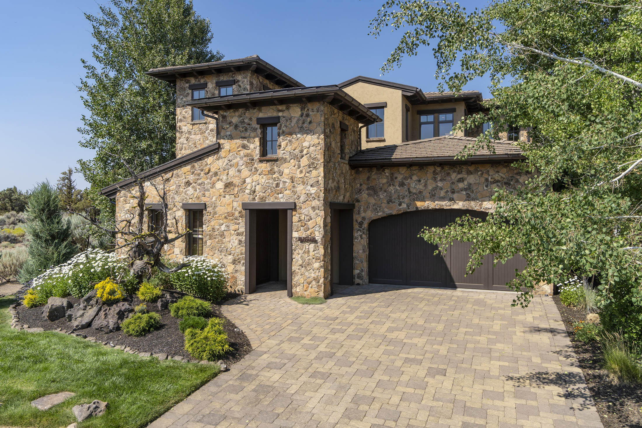 Located on the 17th fairway of the Fazio golf course in the desirable Four Peaks at Pronghorn, this Tuscan inspired home  features a wonderful living area w/ see-thru stone fireplace, office/den with built-ins &  wine cellar. French doors lead to a private covered patio w/ outdoor kitchen, fire pit & putting green. A separate private courtyard with fireplace offers endless entertaining opportunities.  2nd floor features an en suite bedroom & a beautiful master with fireplace, sitting area, coffee bar, beautiful spa-like bath & private balcony w/ expansive Cascade Mountain views.  Casita with separate entrance and kitchenette will make your guests feel right at home.  Oversized attached 2 car garage w/ plenty of storage & separate golf cart garage.  Nightly rentals allowed making this a great investment opportunity!