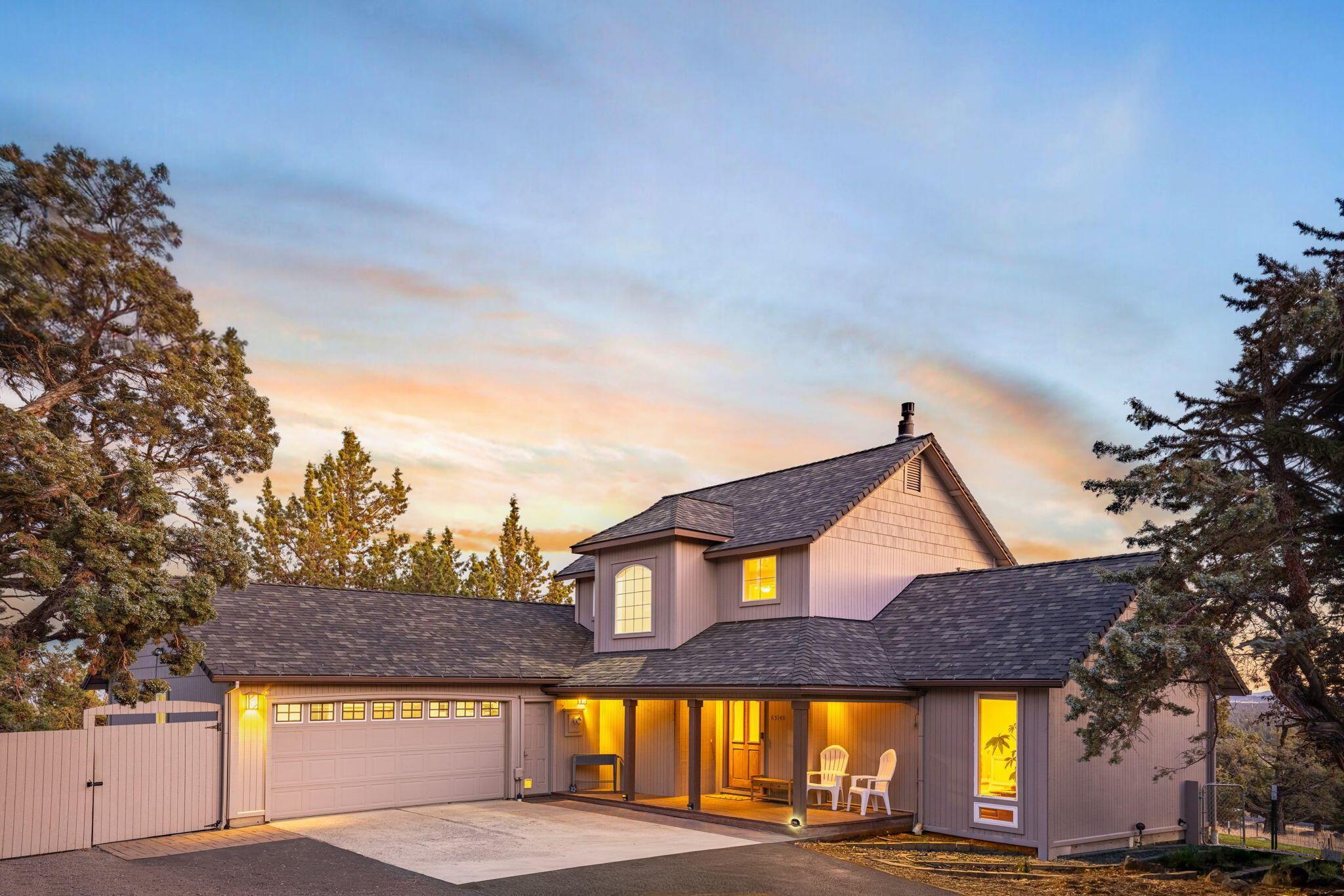 Situated North of Tumalo Road in Bend, this updated home on 2.57 acres offers privacy and convenient access to Bend and Redmond. Main floor primary suite with a walk-in closet, spacious bath with tile floors and shower, and stunning views. Both upstairs bedrooms have fantastic mountain views, as does the back deck. The kitchen has updated solid-surface countertops. The spacious garage measures 720 sq. ft. and features an RV plug. The parking space behind the gate provides ample room for all your toys. This property is a private, low-maintenance setting within the highly sought-after Tumalo neighborhood. Conveniently located near all the best activities of Central Oregon, with jaw-dropping sunrises and sunsets, this property is peaceful and ready to be your Bend home base.