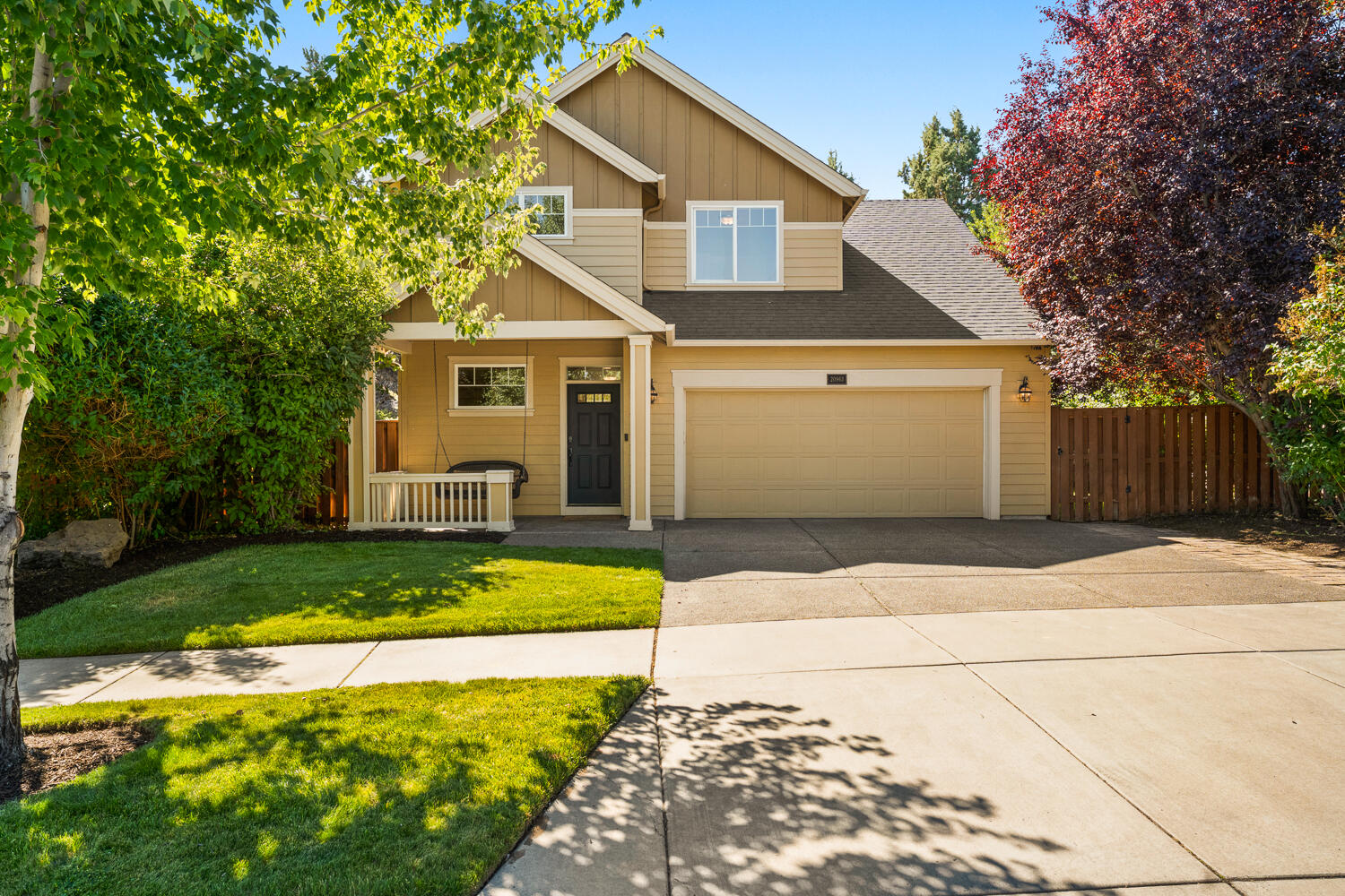 Impeccably maintained and thoughtfully renovated two story home in Lava Ridges in NE Bend. Carefully constructed by Pahlisch homes this Craftsman Vista floorplan offers the perfect blend of comfort, style, and functionality. Step into the inviting great room with a cozy gas fireplace with framed by a stunning stone surround, abundant natural light, and open layout that is ideal for both relaxing and entertaining. The gourmet kitchen is a chef's delight complete with stainless steel appliances, breakfast bar, and designated dining area. Retreat to the second story primary suite with vaulted ceilings and luxurious bath featuring a dual vanities and generous walk-in closet. Outside, unwind in your private backyard oasis with a peaceful rocky outcropping backdrop—perfect for summer BBQs or quiet evenings under the stars. Conveniently located across the street from the seasonal community pool and close to schools, shopping, and dining.  This home is truly a must-see.