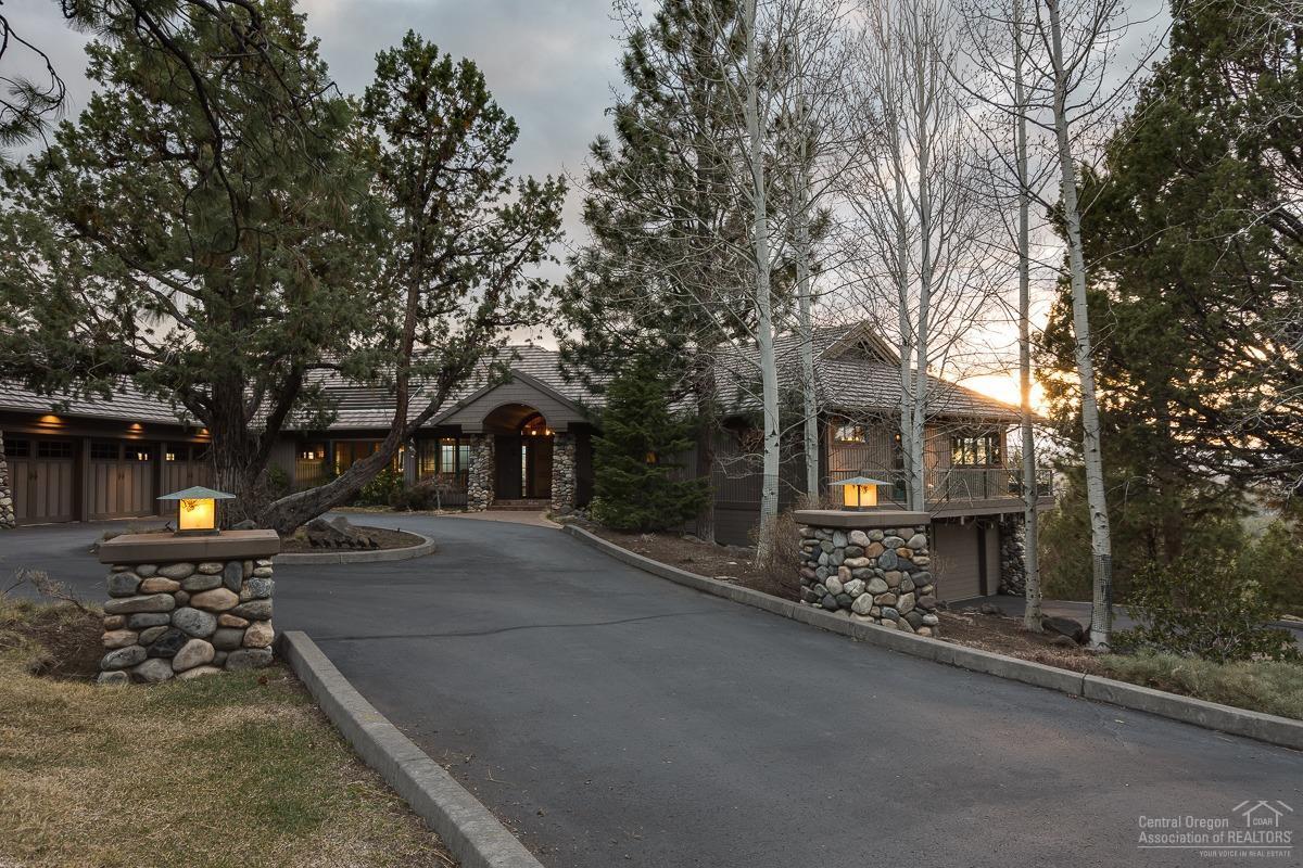 Private luxurious Mountain Estate with Cascade Mountain views from every room. Home is sitting almost to the top of Awbrey Butte on 1.92 acres. All 4 bedrooms are suites. Guest or in law quarters downstairs with private entry and 2.5 car garage. Home features floor to ceiling fireplace and over sized paver stone deck & patio.