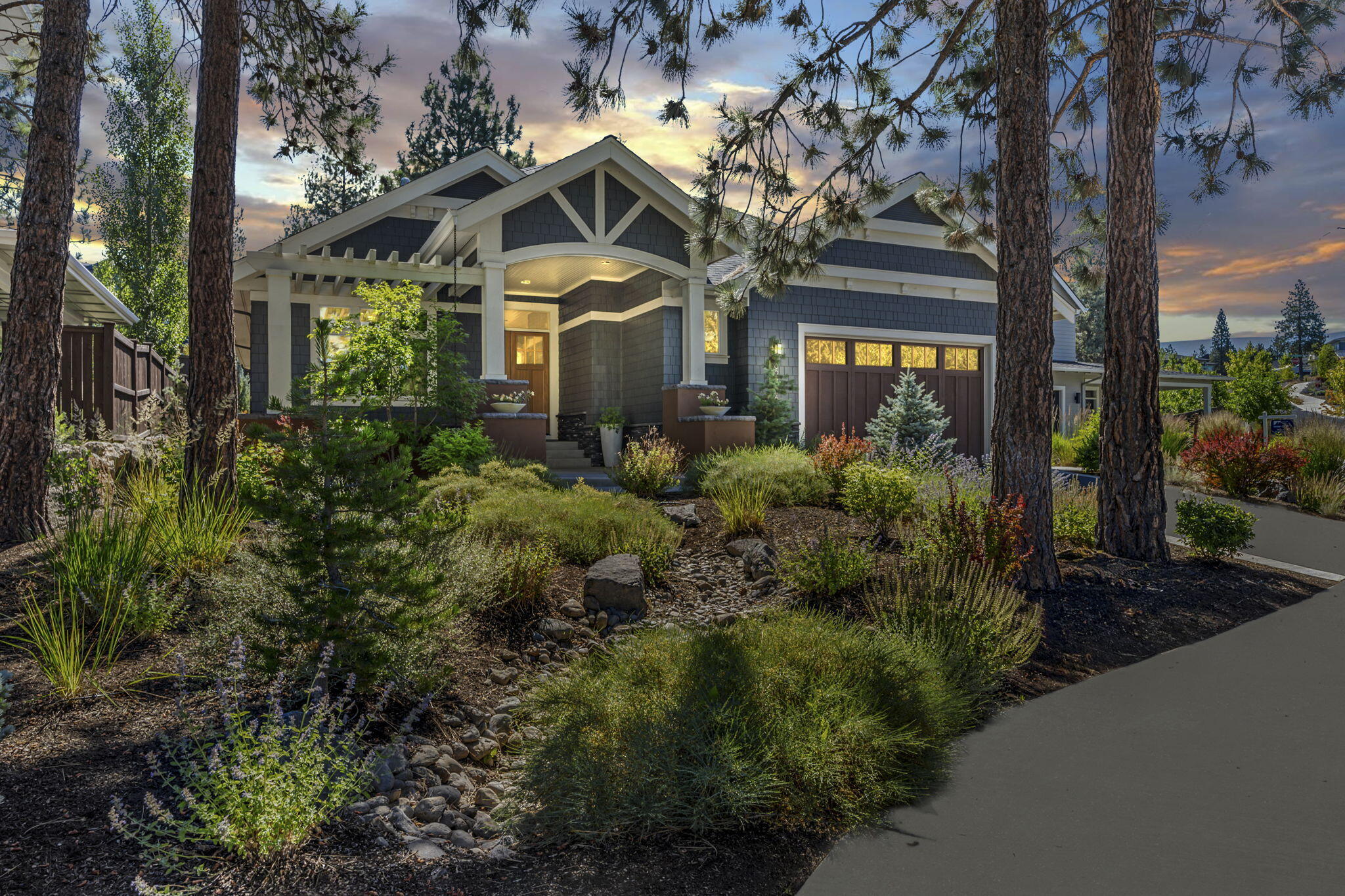 Your search for exceptional single-level living has ended! Captivating curb appeal welcomes you home. Hardwood floors flow throughout and provide a carpet-free interior. High ceilings, smart LED bulbs, & custom window shades are just the start. Entertain friends & family in the spacious great room and be blown away by the custom-crafted kitchen equipped with walnut cabinetry & Monogram appliances including built-in refrigerator. The center island wrapped in quartz houses a wine fridge & custom brass foot rail. Three bedrooms plus office ensure room for all. You'll appreciate the space & serenity of the primary suite complete with patio access & a luxe bathroom that pampers with a soaking tub and custom rain glass shower. Enjoy the rear patio within the fully fenced backyard with no immediate rear neighbors. Additional amenities include an oversized garage and owned solar. This prime NW Bend location puts you in reach of NorthWest Crossing, Shevlin Park, & more at the center of life!