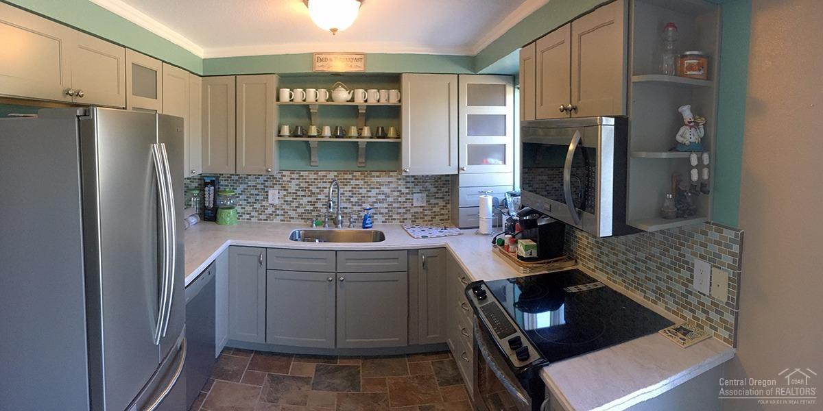 This home went under a major remodel in 2013 which included a completely new kitchen with soft close Cabinetry, and Corian counter tops, all new stainless steel appliances. Soft close Cabinets are also installed throughout the rest of the home, in the laundry room, and both bathrooms. This is a Sportsman's paradise with plenty of fishing, hunting and recreation to be enjoyed. This is a 5 acre gem bordering BLM, making this a peaceful and tranquil property. Two outdoor sheds for extra storage.