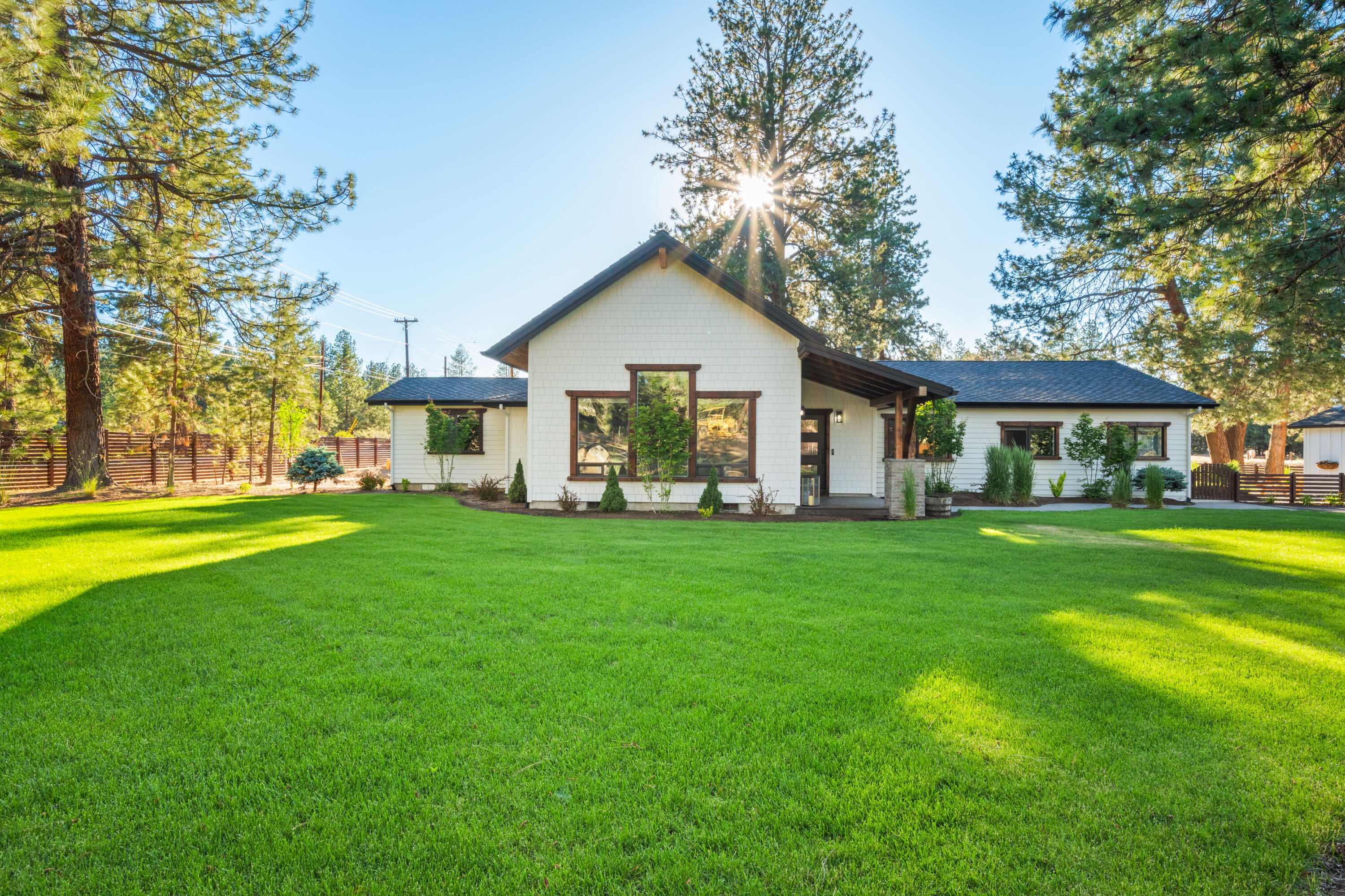 Come see this fully renovated 3005 sf home sits on almost 3.5 acres right outside of Bend city limits. Just a bike ride away from the Old Mill or miles of trails, this home has the best of Bend within minutes. With 1G internet and a spacious office, it is ideal for remote professions.  4 bedrooms (2 primary
 suites) and a beautiful 1 bedroom guest suite with private entrance just steps away for loved ones or visitors. Detached shop w/gym bay, 2 storage areas with shelving, a two car parking bay w/ 50amp electrical outlet ready for an EV charger. Property located outside of city limits, short term rental opportunities possible, fully furnished option available to be negotiated w/offer. Selling agent is co-owner. Buyer to do own due diligence.