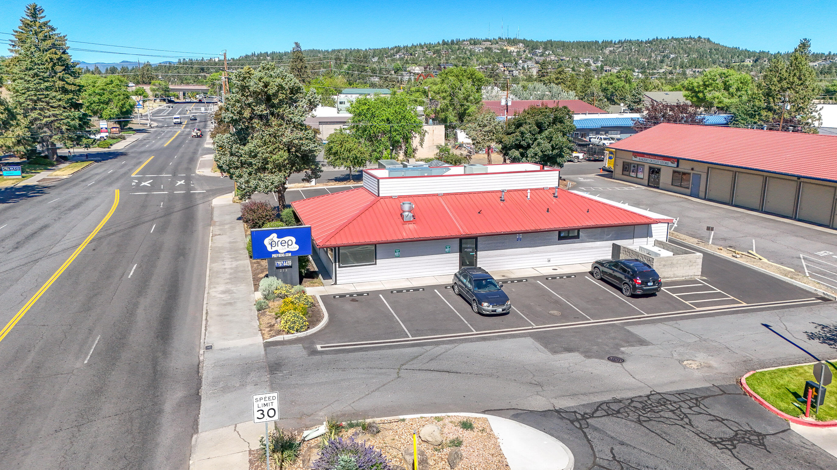 This versatile and exceptionally well-maintained retail/restaurant property
is located in a high-visibility area near the heavily trafficked intersection
of NE Third Street (Highway 20) and Revere Avenue. The property is
currently operating as Prep - A Chef's Kitchen, a shared-use commercial
kitchen where food vendors lease space and equipment on an hourly
basis. The business may remain in operation or be discontinued, allowing
a new owner full control and flexibility.
The building is outfitted with an extensive inventory of high-quality food
service fixtures, equipment, and infrastructure—all in excellent condition.
This is an outstanding opportunity for a wide range of food service ventures,
particularly a restaurant with catering capabilities. The space also
lends itself well to other creative commercial kitchen concepts.
The property underwent a comprehensive renovation in 2017, including
both interior and exterior upgrades. It is in immaculate condition.