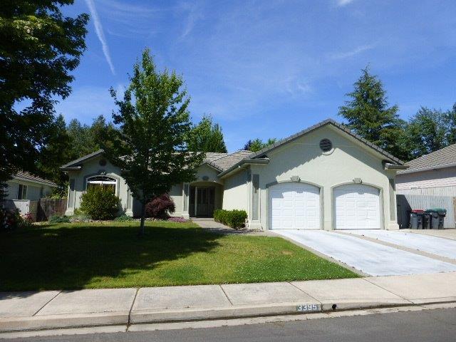 Located in the beautiful Alder Creek Subdivision. This well maintained home has a Great Room with vaulted ceiling, ceiling fan and gas fireplace. The Dining area is also vaulted with 2 skylights and a bay window providing lots of natural light. The Kitchen has granite countertops, gas range/oven, eating bar. Great Room, Dining area and Kitchen are open to each other and have beautiful hickory hardwood floors and custom painted walls. The Master has coffered ceiling with fan and walk-in closet. Bath has tile floors, double sinks, jetted tub and skylight. Two additional bedrooms- one with hardwood floor, skylight and walk-in closet- are on the opposite side of the house from the Master. The finished garage has lots of built-in cabinets. The backyard has a nice patio with a retractable awning to provide shade for outdoor entertaining and relaxing.