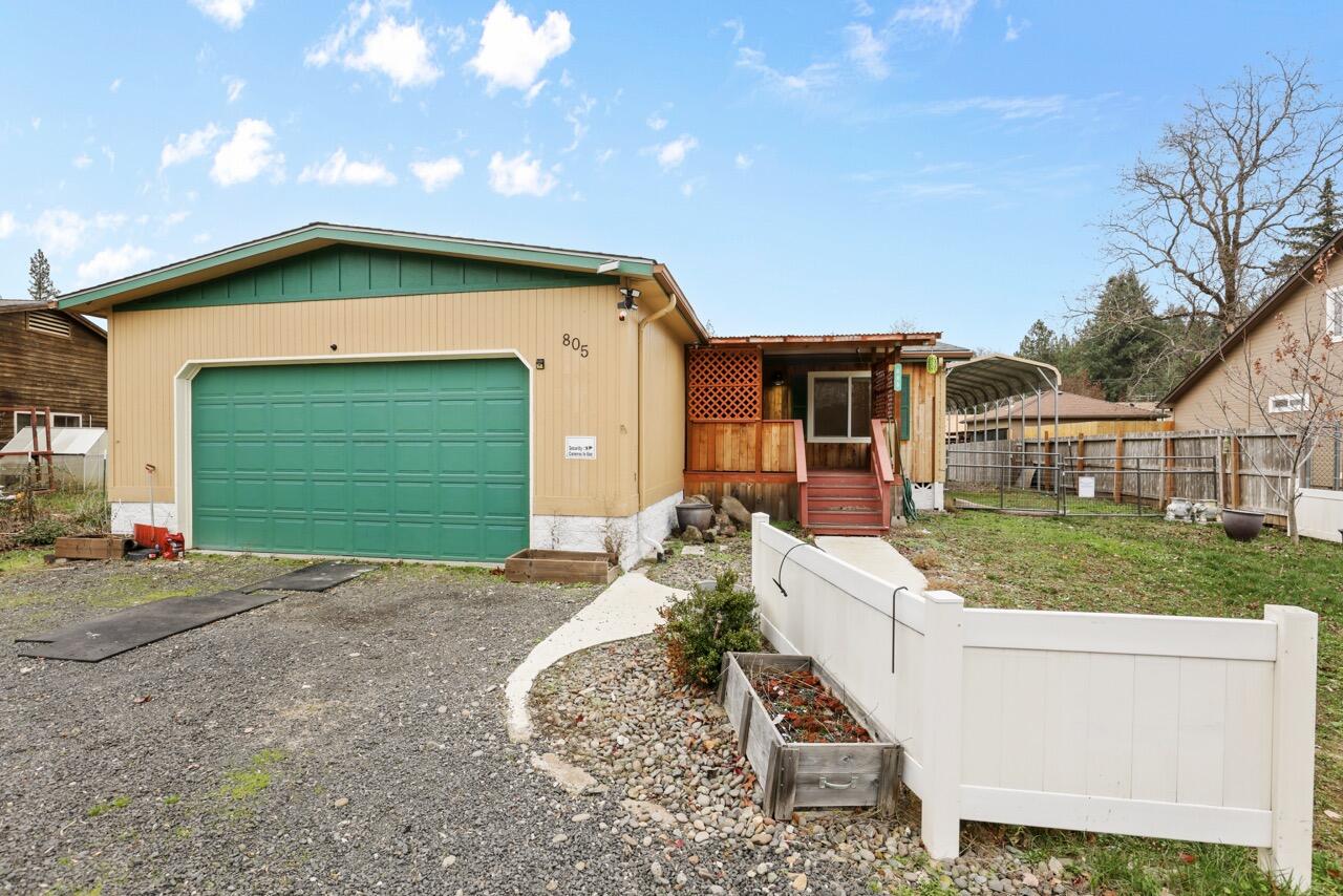 Welcome to 805 Redwood Ave at the end of the road in the peaceful town of Butte Falls! This 3 bed, 2 bath home offers 1,600 sq ft of comfortable living space with a bright, open layout. Enjoy the country lifestyle with a chicken coop, protected garden beds, and plenty of room to roam. The covered back patio with a wood stove is perfect for year-round entertaining, plus there's a gazebo for relaxing and an RV carport for extra parking or storage. Located near local schools and outdoor recreation, this property offers small-town charm with practical extras!