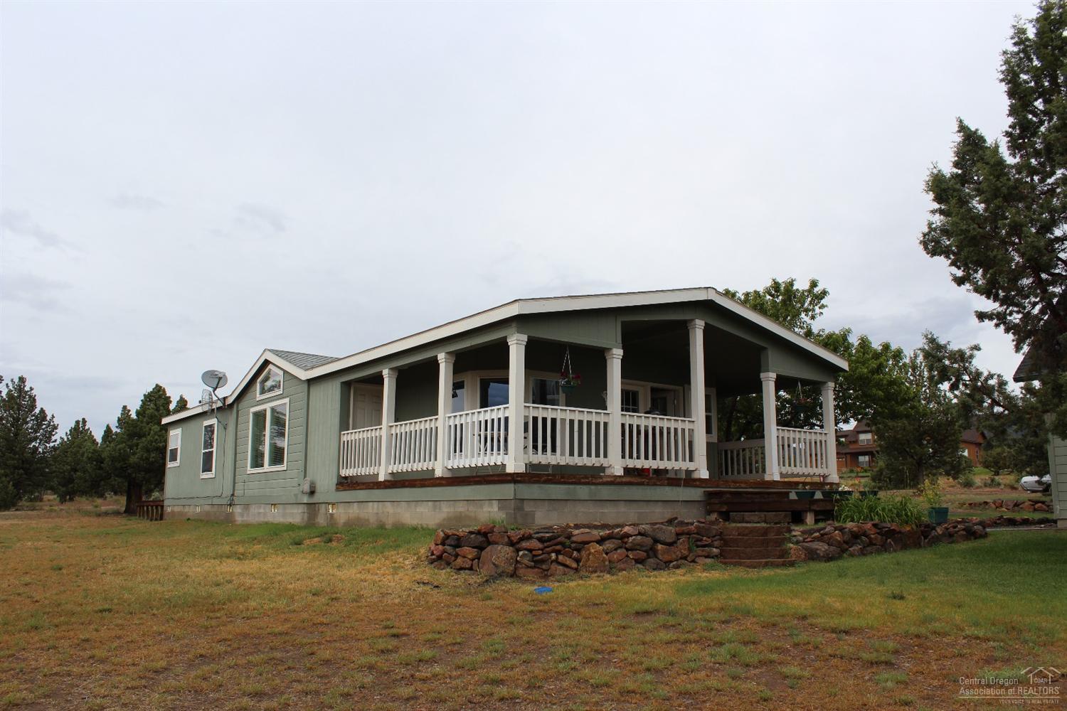 Big cascade and Powell Butte mountain views!! Super clean 3 bedroom 2 bath with open floor plan on 5 acres. Supersized triple car garage/shop with separate room for storage or exercise area. Garage also has full 2nd story area with windows, would make great bonus room. Great deer fenced garden area and more.. Sale fail due to Buyer personal issues. Appraised at value by VA. Vacant, clean and move in ready!!