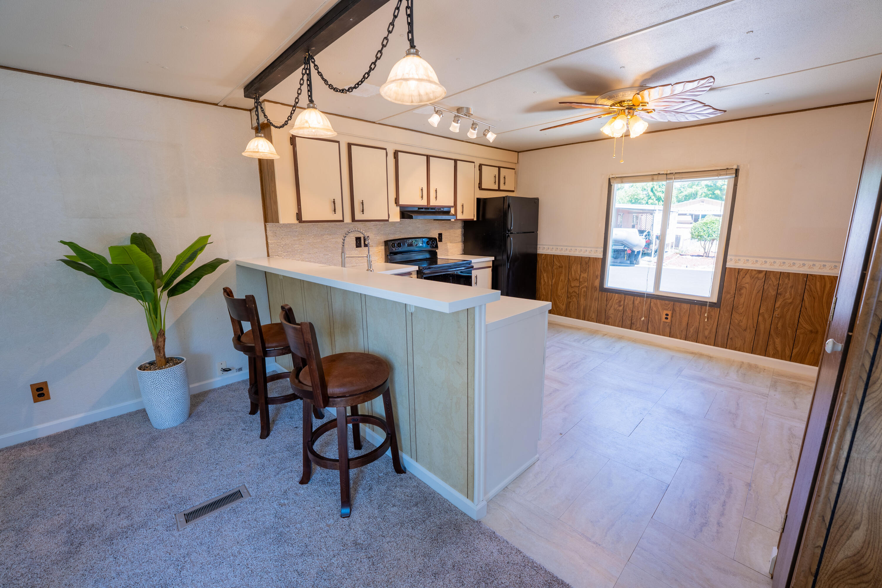 Seller financing opportunity with only $7,500 down. This home is clean and comfortable with some tasteful updates. A new roof was just installed in May, new carpet installed, new large mini-split blows ice cold, and double pane Milgard windows. Space rent of $865 includes access to the beautiful pool, clubhouse, and gym. Home also features two decks, two sheds, and a low maintenance yard. Come take a look! Seller financing offered with $7,500 down, 15-year term, 6.5% APR adjustable rate mortgage (fixed for 3 years). Monthly principal and interest approximately $195 per month. Seller is licensed real estate agent in the state of Oregon.