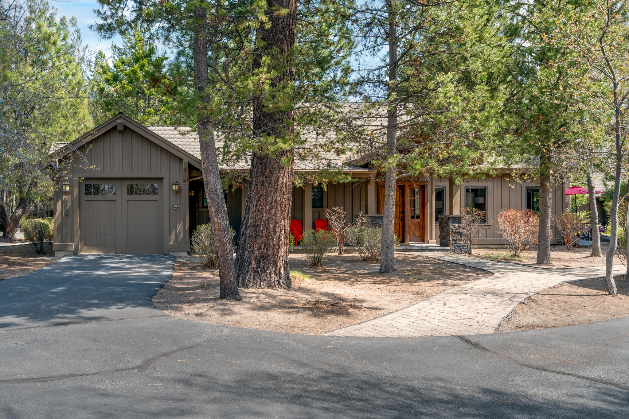 Positioned lakeside in Caldera Springs, this stunning luxury cabin blends high-desert charm with modern elegance—offering both a serene escape and a high-performing nightly rental investment. Wake up to breathtaking water views from the Great Room and primary suite, or unwind in the private hot tub as the sun sets. The home has been recently remodeled throughout- expansive updates include a luxury kitchen and bathrooms, fresh paint, new custom blinds, stonework, new appliances and designer furnishings. This home comes fully furnished and turnkey, perfect for a seamless transition. Featuring two primary suites, three baths, and a grand stone fireplace, designed for effortless comfort. Just steps from The Lake House, Quarry Pool, fitness center, sports courts, golf, and scenic trails, adventure is always within reach. With a strong rental history and abundant opportunity, this is a rare chance to own a retreat that offers both personal enjoyment and exceptional income potential.