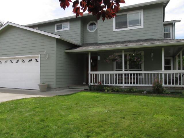 Super desirable location close to Griffin Creek elementary and the new South Medford High. Home features hard to find 4 XL bedrooms with plenty of light and windows with views, fireplace, large formal dining room, separate family and living room, engineered floors, covered back porch, lots of custom touches, french doors, and much more. Don't miss relaxing on the wrap around front porch and large private backyard. Priced for a quick sale - don't miss touring this gem!