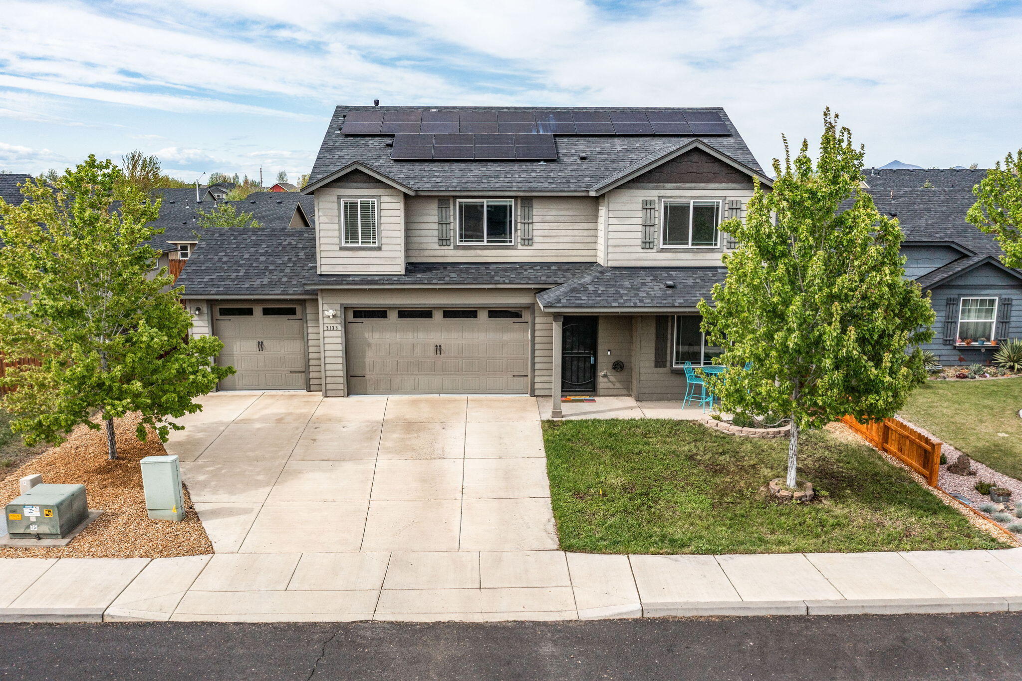 Modern 4-Bedroom plus Office with Solar panels and three car garage in SW Redmond.
This lovely, updated home in a centrally located neighborhood combines space, versatility, and energy efficiency. Featuring four bedrooms plus a dedicated main level office that can easily serve as a fifth bedroom, this layout adapts to a wide range of lifestyles and needs.
The open-concept design seamlessly connects the kitchen, living/dining rooms, and outdoor living areas—ideal for everyday comfort, relaxation and entertaining. Features include owned solar panels, a spacious three-car garage with built-in storage, primary suite walk-in closet, fresh interior paint, updated landscaping plus covered back patio and fenced yard that enhances privacy and outdoor enjoyment. Located close to schools, parks, and shopping, this home offers functionality, convenience and comfort. 
A beautiful, move-in ready home in a sought-after location.