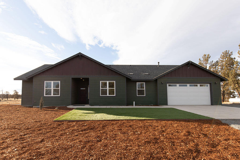 Beautiful Cascade Mountain views, privacy and space, yet just minutes from shopping, restaurants, and outdoor recreation. You get the best of both worlds with the prime location of this 20+ acre property on the outskirts of Bend! Boasting a lovely custom home, large shop/barn, and highly sought after 18 acres of water rights, this place has it all. The home has a fantastic open living/dining area with sliding door leading to a large covered back patio to enjoy the view. The kitchen has granite countertops & hickory cabinetry, as well as a huge pantry/mudroom that leads to the garage. Enjoy more views from the Owner's Suite, w/spacious bathroom & fully tiled walk-in shower. The floorplan allows for a lock-off bedroom/office/bath combo w/private entrance, making a perfect lock-off rental, guest suite, or multi-generational living. Hobby farm, mini-ranch, equine property... so much potential!