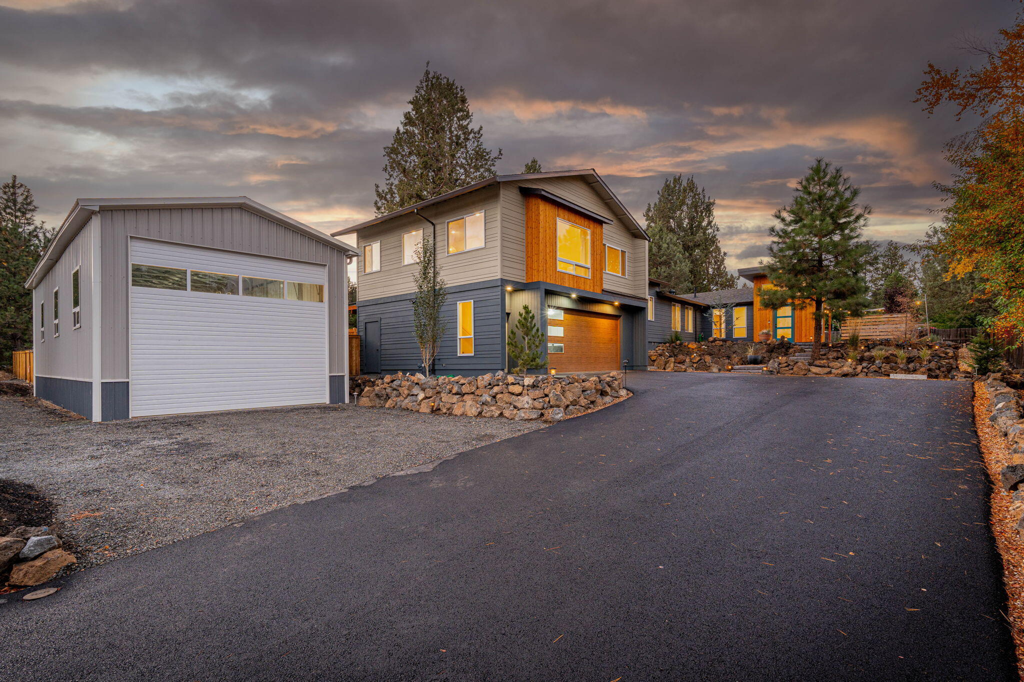 Total square footage is 2,830. This beautifully designed SE Bend property includes a complete renovation, a 1,700 SF expansion, new siding, and meticulously landscaped grounds. 
The 2,040 SF main home boasts an all-new primary suite with a walk-in closet and spa-like bathroom, spacious family room, laundry/mudroom for convenience, and three distinct outdoor entertainment spaces. 
The 790 SF ADU is City-approved, offering a one-bedroom layout, spacious walk-in closet, and a well-appointed bathroom. The main area is a versatile great room with laminate floors, Corian kitchen countertops, tankless hot water heater, new appliances, electric fireplace, and hyperheat mini-split system. 
For those with RV or storage needs, the 1,000 SF shop provides endless opportunities. The new asphalt driveway and extensive landscaping welcome you to this incredible home. This property is not just a house; it's an exceptional lifestyle opportunity. Don't miss your chance to experience this extraordinary home.