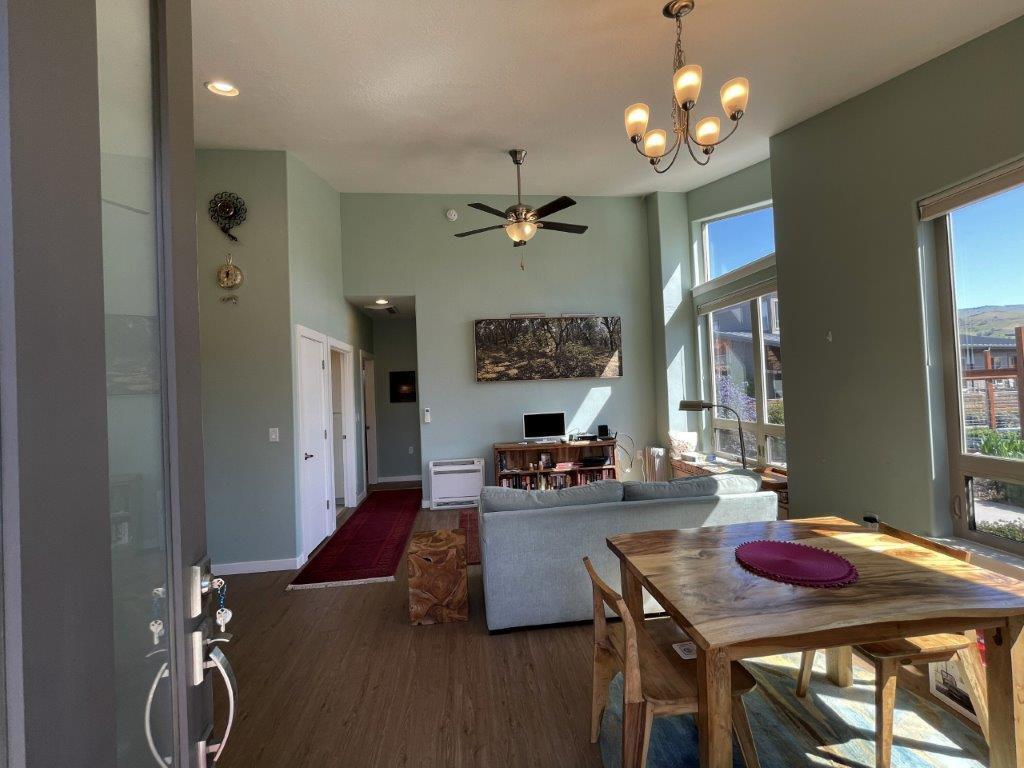 A fabulous Verde Village Cottage Community Phase I townhome built in 2017. It has one bedroom, one bath and with vaulted ceilings that gives it a spacious feel. This Net Zero townhome has installed solar panels (2.7KW) supplementing the electricity. Construction is to Earth Advantage Gold Standard. The unit is adjacent to open space (community gardens) on two sides. One space in the fenced garden is for this unit. There is also assigned carport parking.