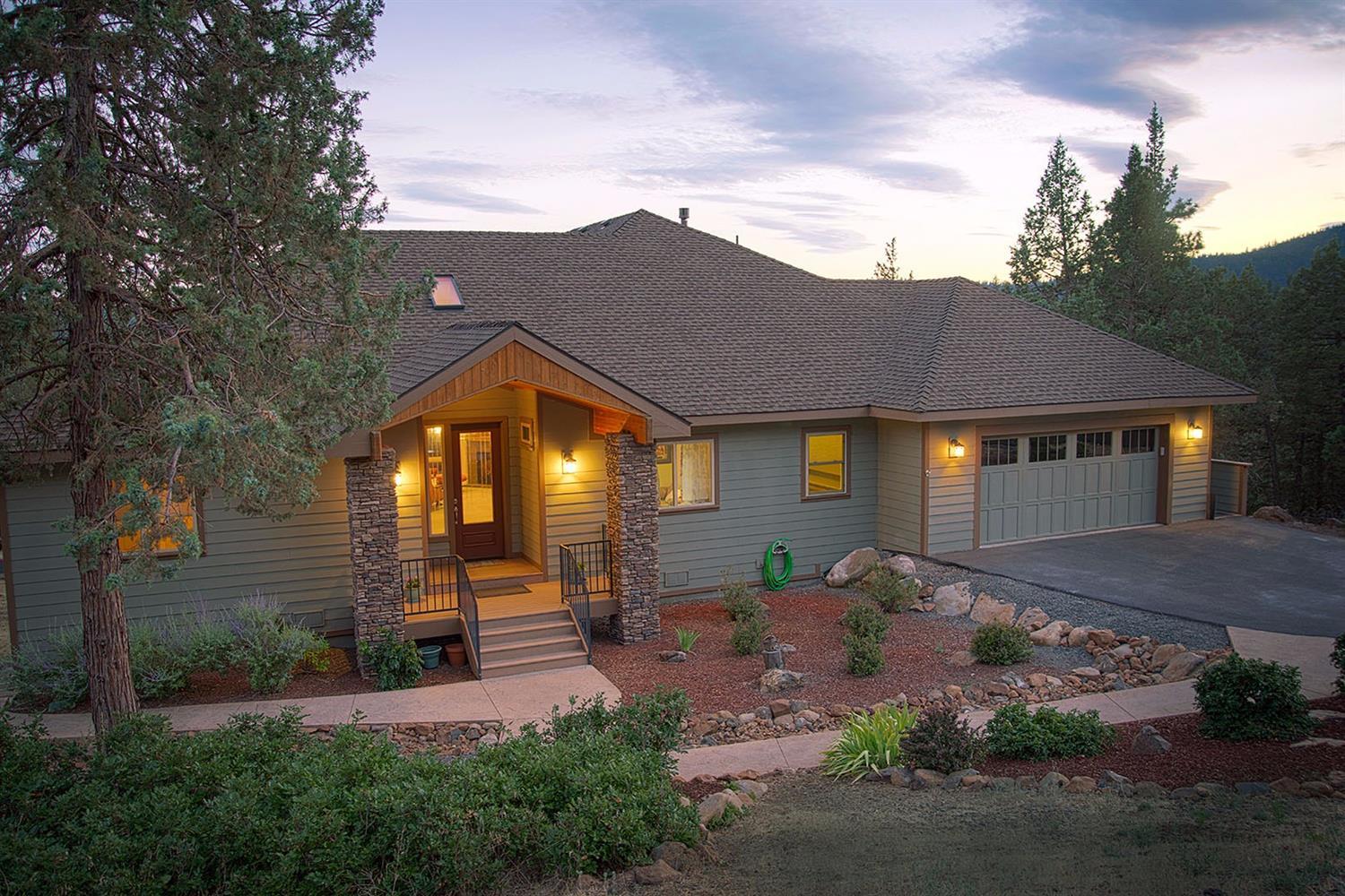 This home is not a drive by. As you enter , everything you want is on the first floor to include living room with fireplace, master bedroom with fireplace, computer room with closet, good sized second mini master bedroom and dining room complimented by an open kitchen set up for entertaining with a walk out large deck. There is an elevator that accesses the lower level. There you will find a generously sized bedroom with bath area, family room, and mini kitchen that leads out to a lovely patio area and work shop. Resort amenities that enhance this upscale property include a huge enclosed pool, spa, work out club, miles of trails, doggie park, well equipped children's play area, 18-hole PGA golf course, restaurants and so much more.