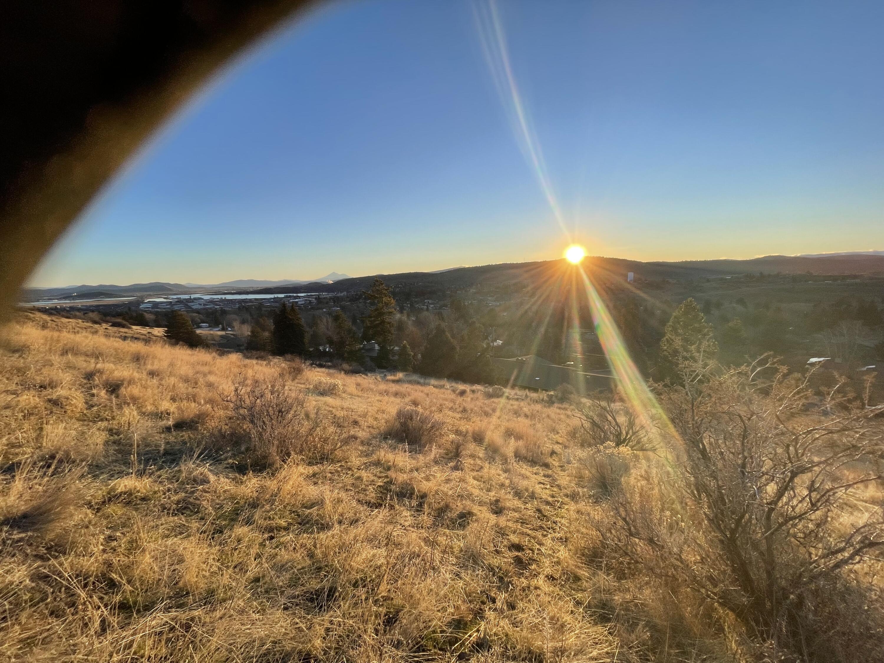 Mountain View Addition was created to take advantage of the western sunsets over the Cascades. Fairmont St is at the top of the City lots and this half-acre lot has one killer panoramic view. This lot is being sold individually or you can buy it with the adjoining lot and have super access. You would have ample separation for creating a mountainside oasis, with 180 degree views. Mountainside homes can be especially attractive because you live above the street with views over Pacific Terrace, western sunsets and to North Klamath Lake. Grab this lot today and start planning your never-move-away home.
