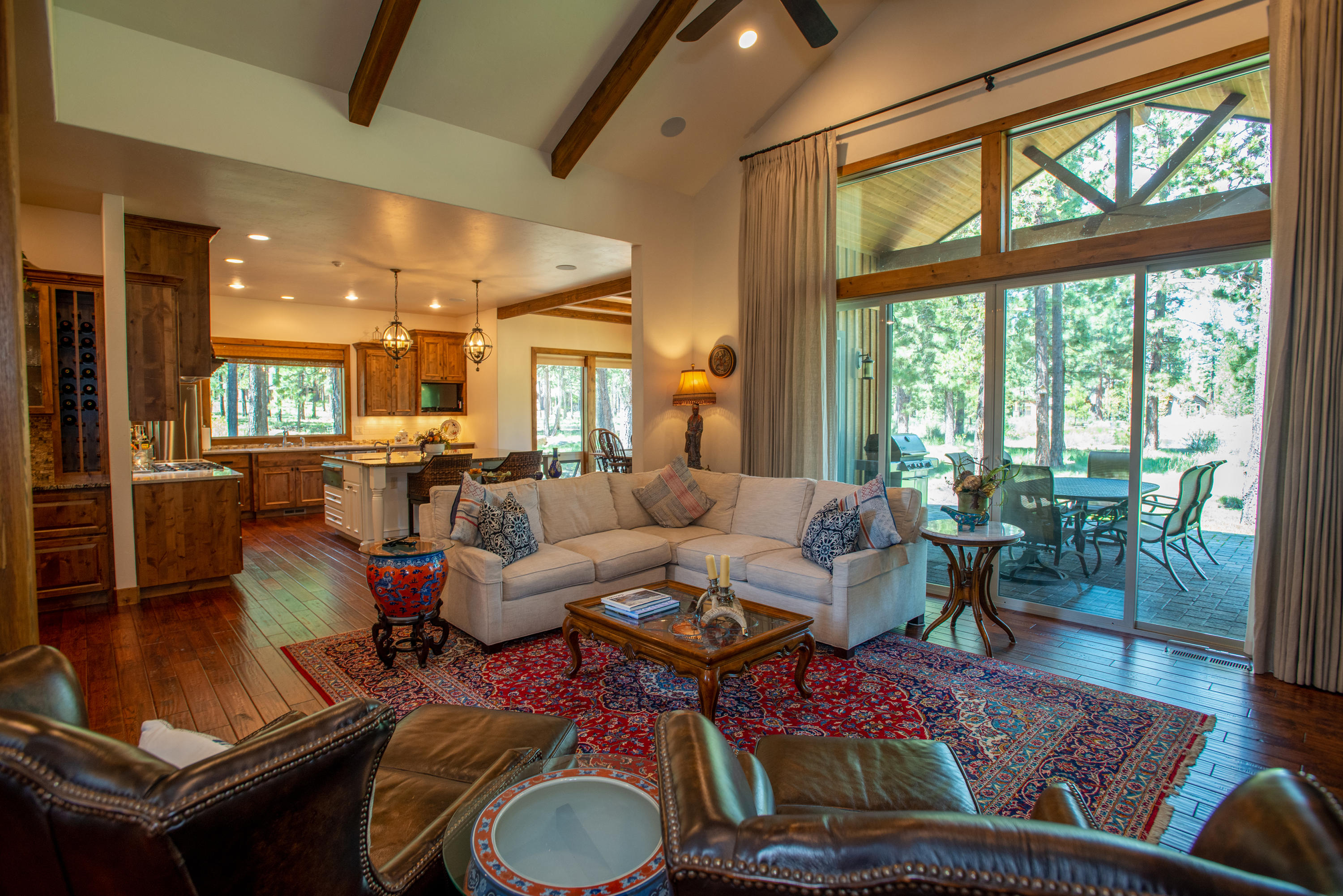 A Prestigious location with breathtaking views of Fireglass Lake and stream. Nestled in the pines this spacious open floor plan has extraordinary attention to
detail throughout that will exceed you expectations. This luxurious home features a beautiful vaulted entry, beam work and gorgeous use of a natural stone
fireplace, an entertainers gourmet kitchen and impressive great room that opens up onto an expansive patio. abundant windows, main floor master suite with a
fabulous bath, 2nd en suite bedroom, Upstairs living space opens to a wonderful balcony overlooking the Pond.