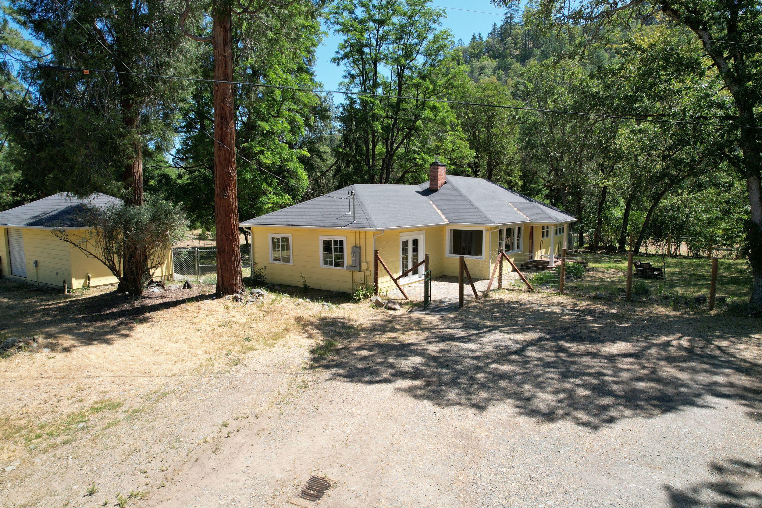 Creekside Mini-Farm in Williams Valley!
Welcome to your own slice of country paradise! This cozy country home is well-maintained & sits on 6 fully fenced & X-fenced acres w/ gated entry & dual creek frontage on both Williams & Powell Creek. A rare & tranquil feature. This home offers modern comfort w/ a nicely updated kitchen & newer wood stove insert, perfect for cozy evenings. Step outside & enjoy thoughtfully fenced front & back yards, ideal for pets & play. Hobby farm enthusiasts will love the combination a small farm set-up & Rural Industrial zoning. A 54x26 barn w/ 2 stalls, multiple corrals. Small fenced fields ready for your own additions. An equipment shed, a 24x14 well house w/ roll up door & room for shop & storage. The 26x32 shop w/ roll-up door is suitable for welding w/plenty of space for tools, projects, or even a home business. Move-in ready & brimming w/ potential & bordering the popular Pacifica, a garden in the Siskiyou.