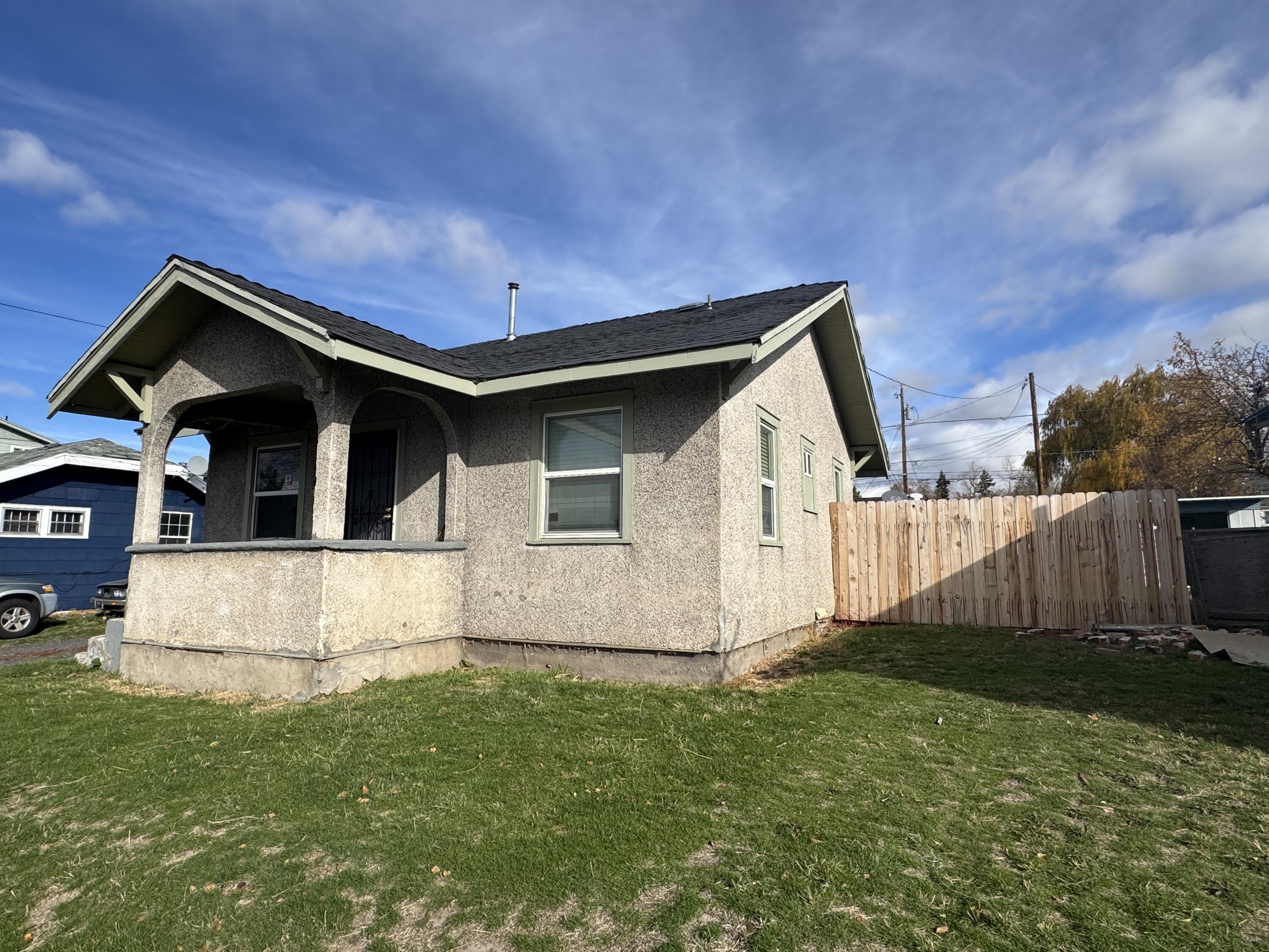 Fantastic investment opportunity! This remodeled, 2 bedroom, 1 bathroom cottage is centrally located in Klamath Falls with quick access to public transportation, restaurants, shopping, hospital and college. Large, fenced yard and detached garage offer plenty of space outside for gardening, room for extra parking and space for pets. Inside is ready for you to move right in; packed with original charm with built-ins and arched doorways, this cozy home also features lots of large windows offering a bright and cheery atmosphere. Separate laundry and dining areas. Great potential for fantastic rental income or comfortable living-schedule your appointment today!