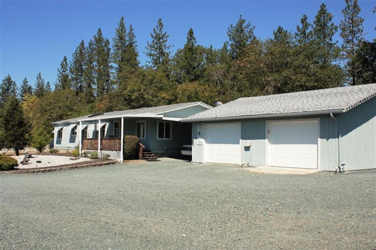 City close country living! White rail fence, views, pasture, comfortable home with split floor plan, 2 car garage with extra shop area, carport, garden equipment shed, RV port with hook ups.