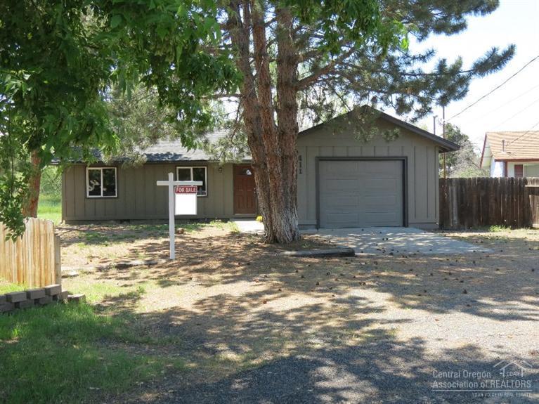 Want that large lot? Well here you go! .47 acre lot with a 3 bedroom 1 bathroom home that has been gone through from head to toe. New paint, new flooring, new appliances, landscaping and so on...to make this home ready for you. Electric heat pump provides air conditioning, wood stove gives you that extra warmth in the winter months. Attached garage with a treed lot and room for your toys.