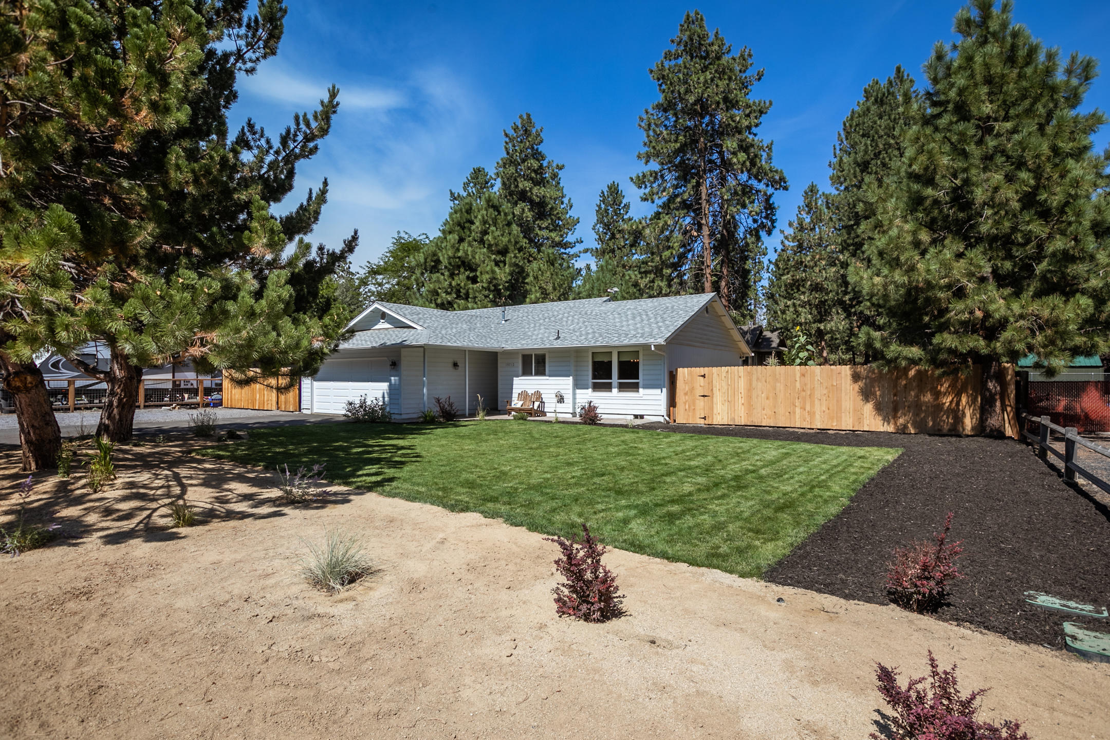 Here it is! Remodeled single level with room to park multiple RVs. It really could not be much cuter. These owners have transformed this home and property and it is ready for its new owners. Large fenced backyard with HUGE shed, room for multiple RVs, and room to build a shop too! The garden is bursting with veggies to be cooked in the new kitchen. The list of recent upgrades is too long to fully list here but includes windows, wood stove, whole kitchen remodel including all new appliances, lighting, new deck and landscaping to name a bit of what has been done to upgrade this beautiful home. Close to excellent neighborhood retail/grocery and elementary school. Ask your Realtor for the full list of recent upgrades and come see this wonderful property today.