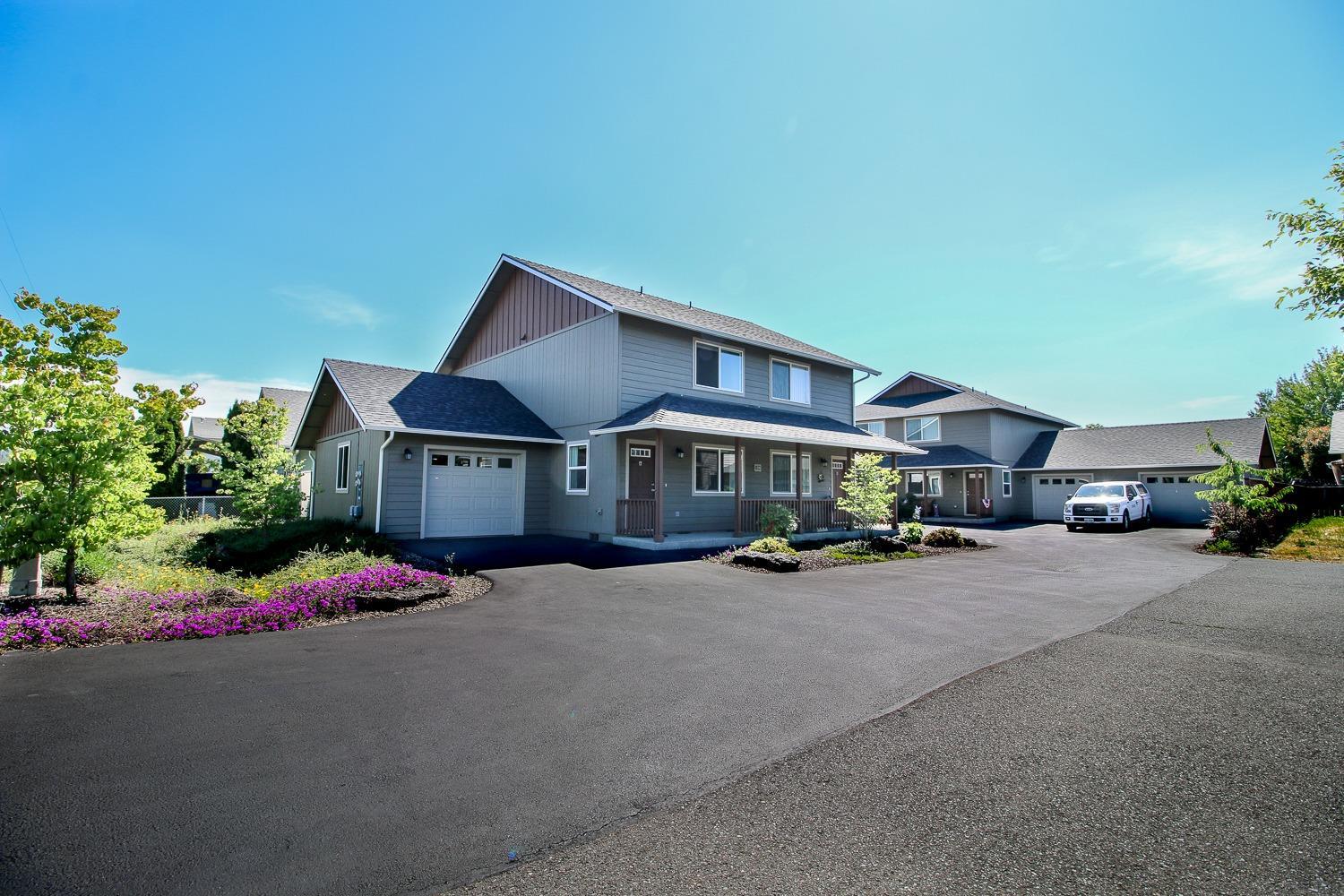 Secure Investment, newer, 2015 4-Plex, impeccably maintained down to the grounds. All units have 2 bedrooms and 1.5 bathrooms. Current market rent is $52,800 year but could be $57,600 a year. Beautifully built with many upgrades like granite counter tops, stainless appliances, private yards, wood-laminate floors and garages. All units are metered separately. Don't miss your chance to own this great investment.