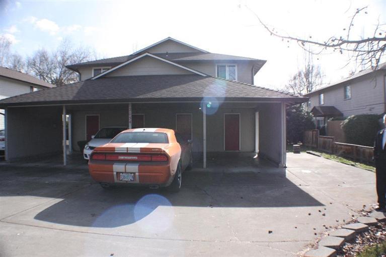 Well maintained townhouse style 4-plex. This is a great investment at just over $93 a square foot. All units are the same size and have 2 bedrooms and 1.5 bathrooms, laundry hookups, and carports with storage units. Two units have large, fenced backyards. Three units have all new carpet and one unit has new paint. One unit has been leased at $725 which is market rent but the others are at $595, and two are at $650 month. Current rent is $2695 month and market rent is $2900 month. Maintenance records are available. Located across the street from North Medford High School.