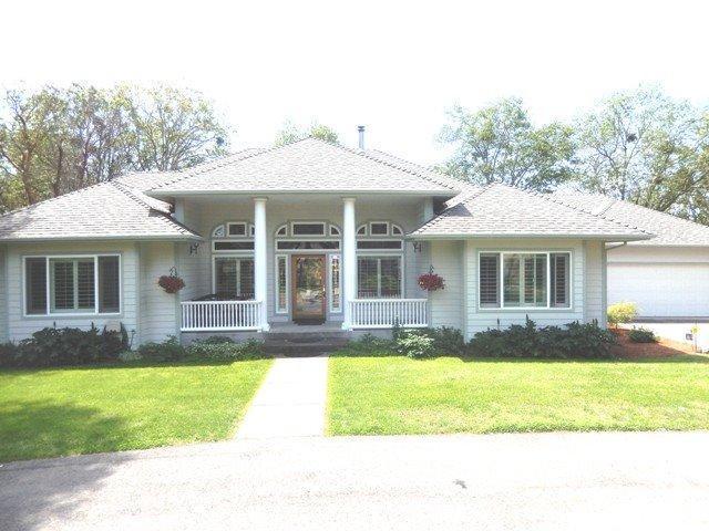 Impressive home in an impressive subdivision. Just 2 miles from Grants Pass in the Valley Rogue Highland Estates. Home was built by Dave Adams in 1998. Impressive entry with a spacious floor plan, vaulted ceilings through out, great views from every window. Spacious 20 x 40 foot Shop and non-conforming one bedroom guest house of 950 sq ft. Entertain in the backyard with large Gazebo that overlooks the valley below. In-ground sprinklers, paved circle driveway, grape arbor, greenhouse, RV parking and hookups and irrigation equipment and pump included. Enjoy all of this on 4.20 acres.
