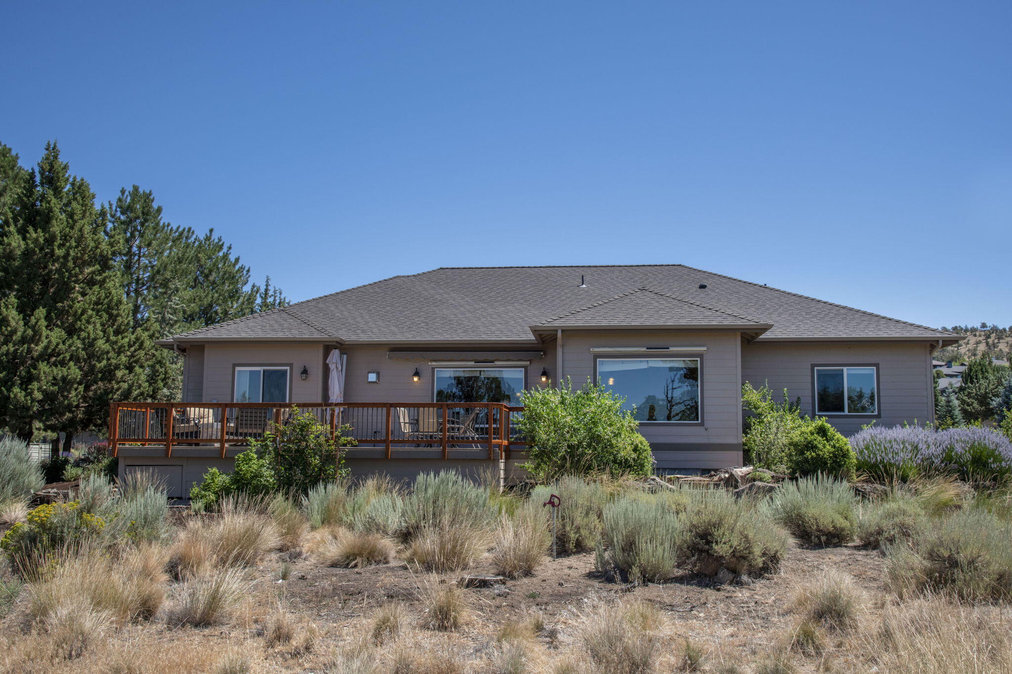 Location! Location!  This one level home backs to BLM with views of the Cascade Mountains.  Featuring open floor plan, office, new oak engineered floors, Tile countertops and an Energy Efficient heating and cooling system. The oversized garage is a great addition for extra workspace.  The newly built expansive deck with built in fire pit overlooks the mountains with tons of privacy. Enjoy Eagle Crest amenities.
