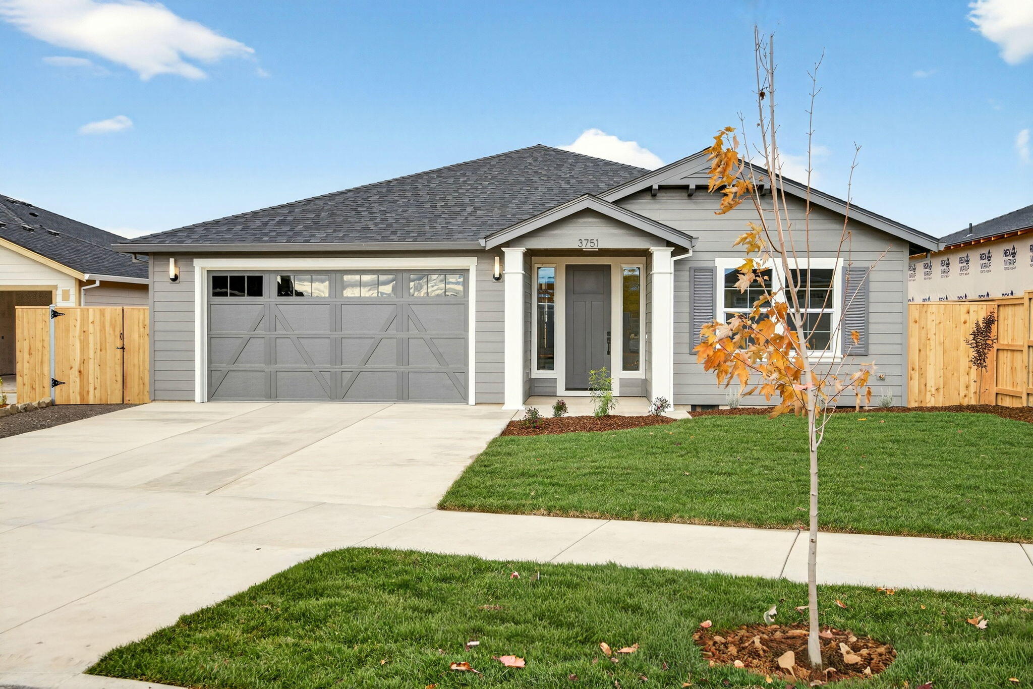 New home by Charles Mahar in phase 2 of the Autumn Hills Subdivision. Conveniently located next to schools/shopping and surrounded by mountains, this new subdivision has a country feel within the city. This well-crafted floor plan features 1660 sq ft of custom living space including 3 beds & 2 baths. You will find high-end cabinetry, leathered granite countertops, full height tile backsplash, upgraded appliance package(including refer) and a large pantry in the kitchen leading you into an open/spacious living room with a gas fireplace and hand-crafted wood mantel. This home has many upgrades including soaring ceilings, large window packages for extra light, luxury laminate throughout all main living spaces and bedrooms, full tile shower w/ seat in the primary bath, large/deep tub w/ tile surround in the hall bath and upgraded ductless heating and air system with wall mounted zone control. You will love the covered patio & professionally landscaped yard in this move in ready new home!