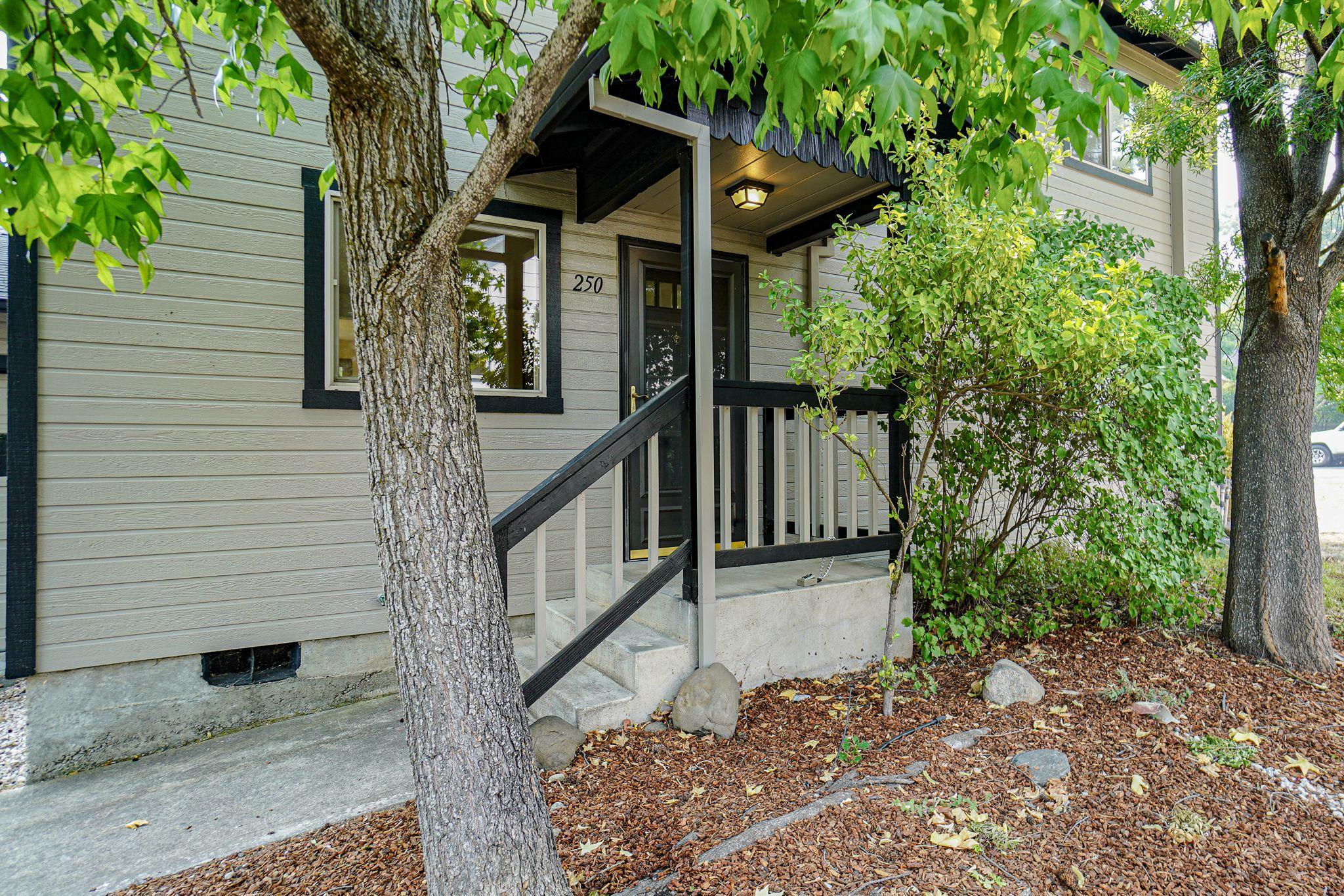 Exceptional Condo located w/in a mile of the Ashland downtown plaza!  Exterior has recently been painted & the interior will completely WOW you!  All new paint, new carpet upstairs, new engineered hardwood on the main floor, newly painted cabinetry, all new (never been used) stainless appliances that include the dishwasher, microwave, fridge, oven range, new stone countertop in the kitchen, new light fixtures, huge kitchen pantry, & more!!  The condo comes w/ its own one car garage & private fenced in patio off of the dining area.  There's a common area laundry facility w/ washer & dryer.  The condo is financeable because there are only 4 units in the association. The is truly a gem in a fantastic location!!