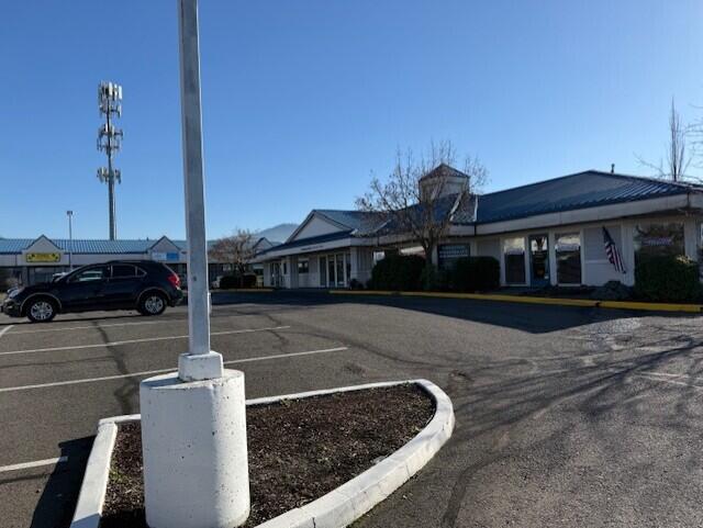 Multi-tenant Strip Center.  Suite is an end cap, open single span construction, 2 restrooms, kitchen area and multiple entrances.  Ideal for office use, cubicles can stay or be removed.  Center has 132 parking spaces.  Rent is $0.95 per square feet plus a CAM charge of approximately $0.10 per square foot.