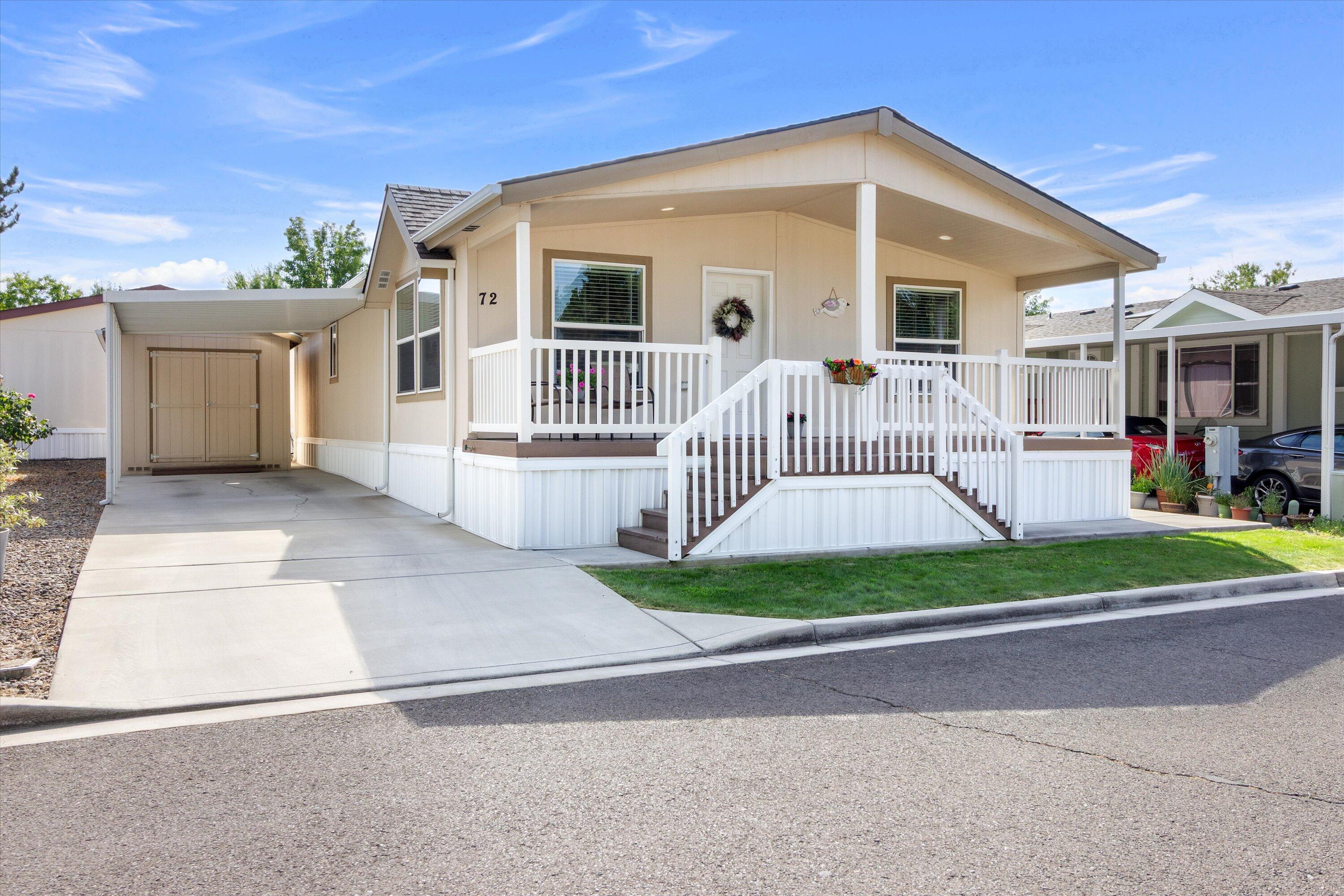 First time on the market, this beautifully maintained 2018 one-owner home in the desirable all-age San George Estates is ready for you! Offering 2 bedrooms plus a den, vaulted ceilings, and a bright, airy feel, this home features a wonderful kitchen with white shaker cabinets, an eat-in dining area, and all appliances included. The spacious primary suite offers a walk-in closet and a large en suite bathroom. Start your mornings with coffee on the charming covered porch and in the afternoons, unwind with a glass of iced tea in the shade, enjoying the gentle breeze and friendly neighborhood atmosphere. Additional highlights include great curb appeal, a low-maintenance yard, covered carport and large 10x15 shed.  Enjoy all the wonderful amenities the San George Estates offers; clubhouse, swimming pool, exercise room, playground and more.  Schedule a tour today!