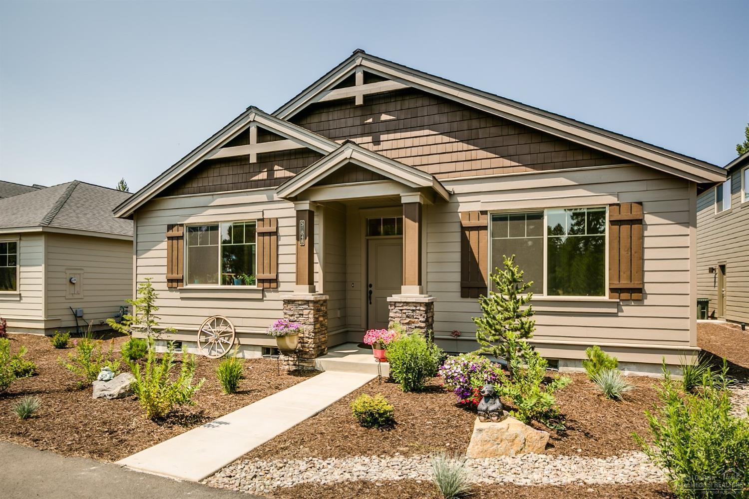Quiet very desirable Pahlisch neighborhood w/paved streets & well maintained homes. Almost new home has gorgeous interior w/laminate flooring in Great Room & gas fireplace that goes all the way to the highest point on the vaulted ceiling! Tiled master shower, 2 sink vanity, huge master closet & bedroom will easily fit a king bed! Two ceiling fans & cellular blinds keep the home cool enough you don't need A/C! Alley accessed 2+ car garage, gas heat & city utilities. Low HOA fees, nice community amenities!