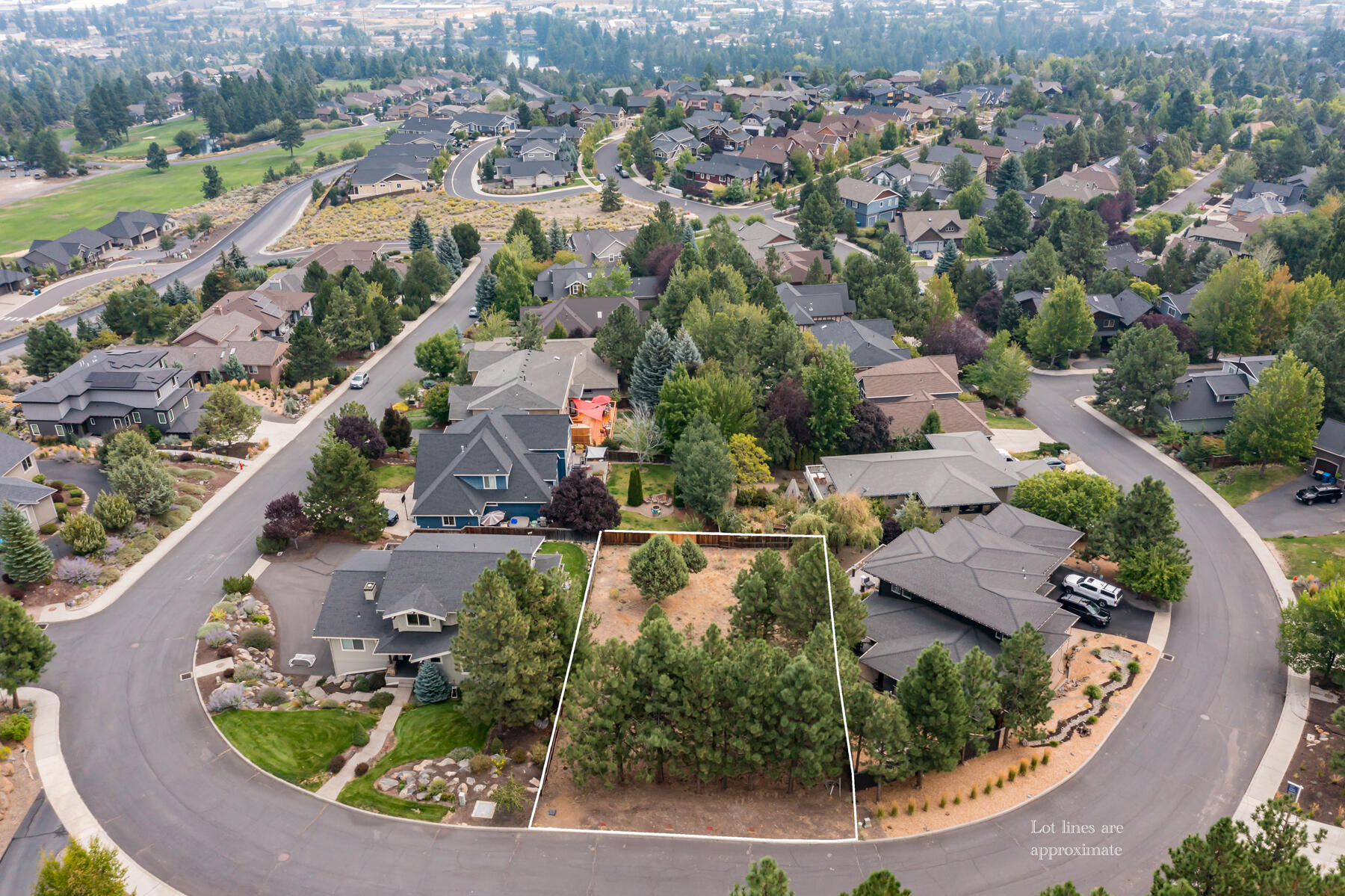 This nearly quarter-acre homesite offers a rare chance to build in one of Bend's most prestigious neighborhoods. Nestled just off NW Awbrey Road, the property is positioned to capture beautiful easterly views - perfect for enjoying the morning light from your future back deck. An exceptional location offers the ideal blend of convenience and tranquility - just 5 minutes to the shops and restaurants on Newport Ave and 6 minutes to downtown, yet elevated above the city in the peaceful, retreat-like setting of Awbrey Butte.